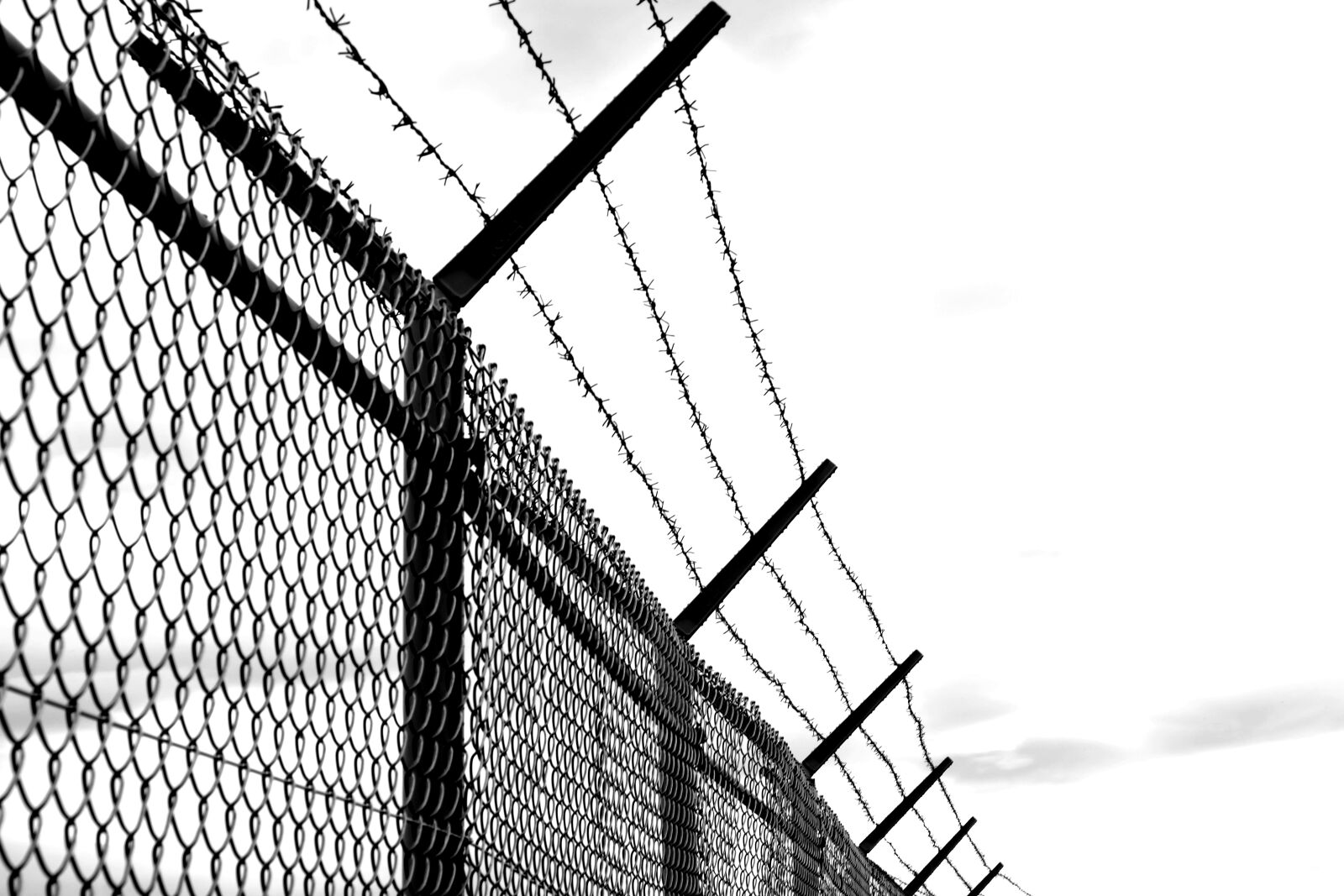 Fujifilm X-E1 sample photo. Barbed wire, fence, old photography