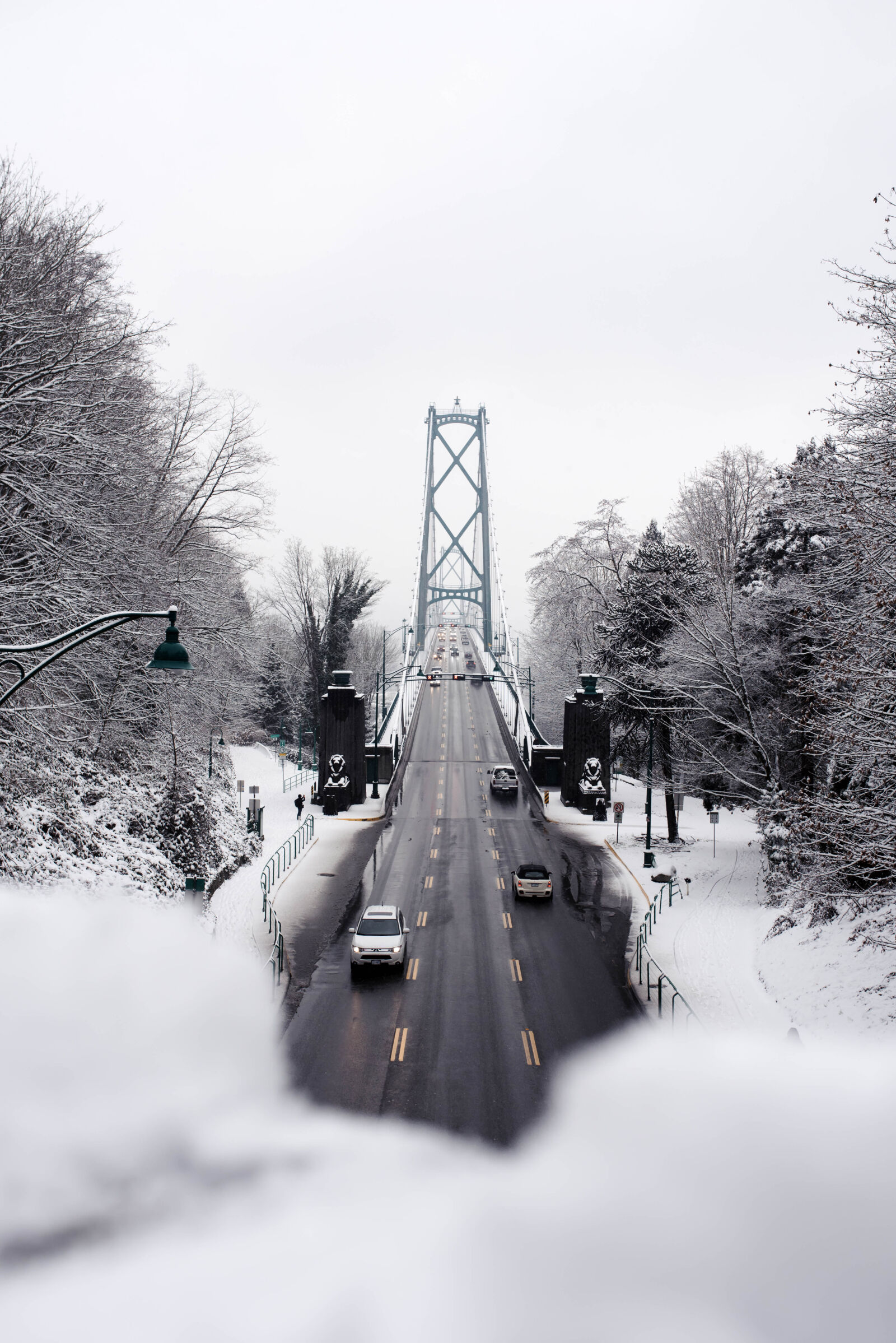 Sigma 35mm F1.4 DG HSM Art sample photo. Bridge, canada, cars, snow photography