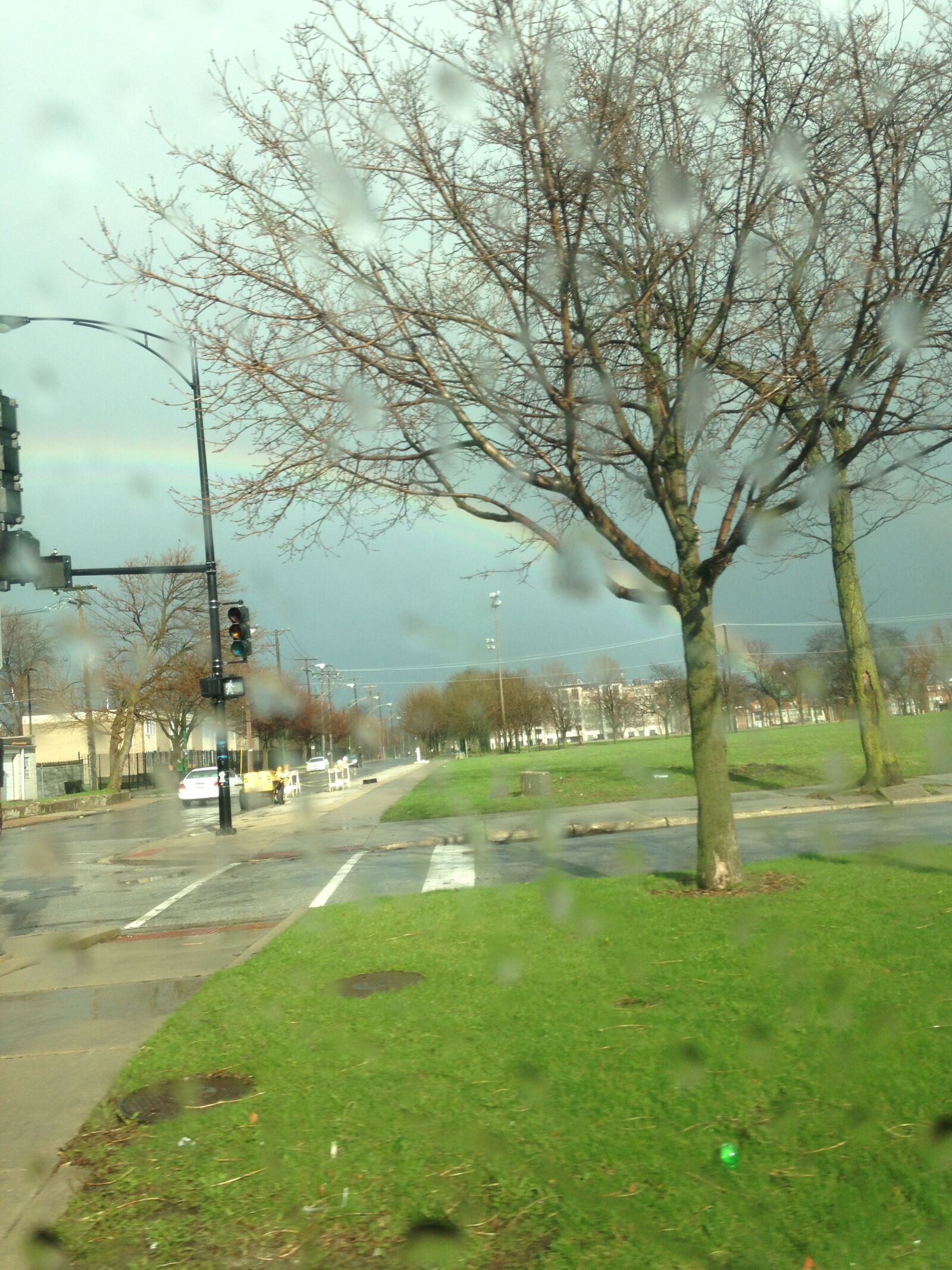 Apple iPhone 5c sample photo. Rainbow, weather, inner city photography