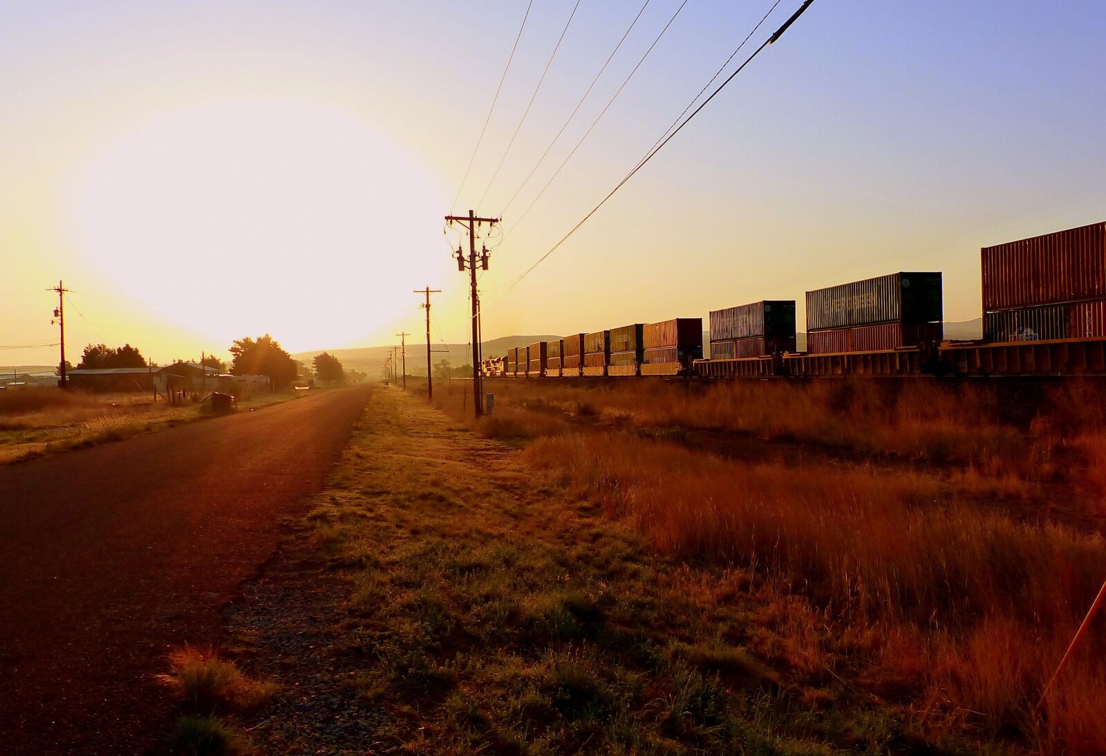 Panasonic Lumix DMC-FZ200 sample photo. Train, goods, dawn photography