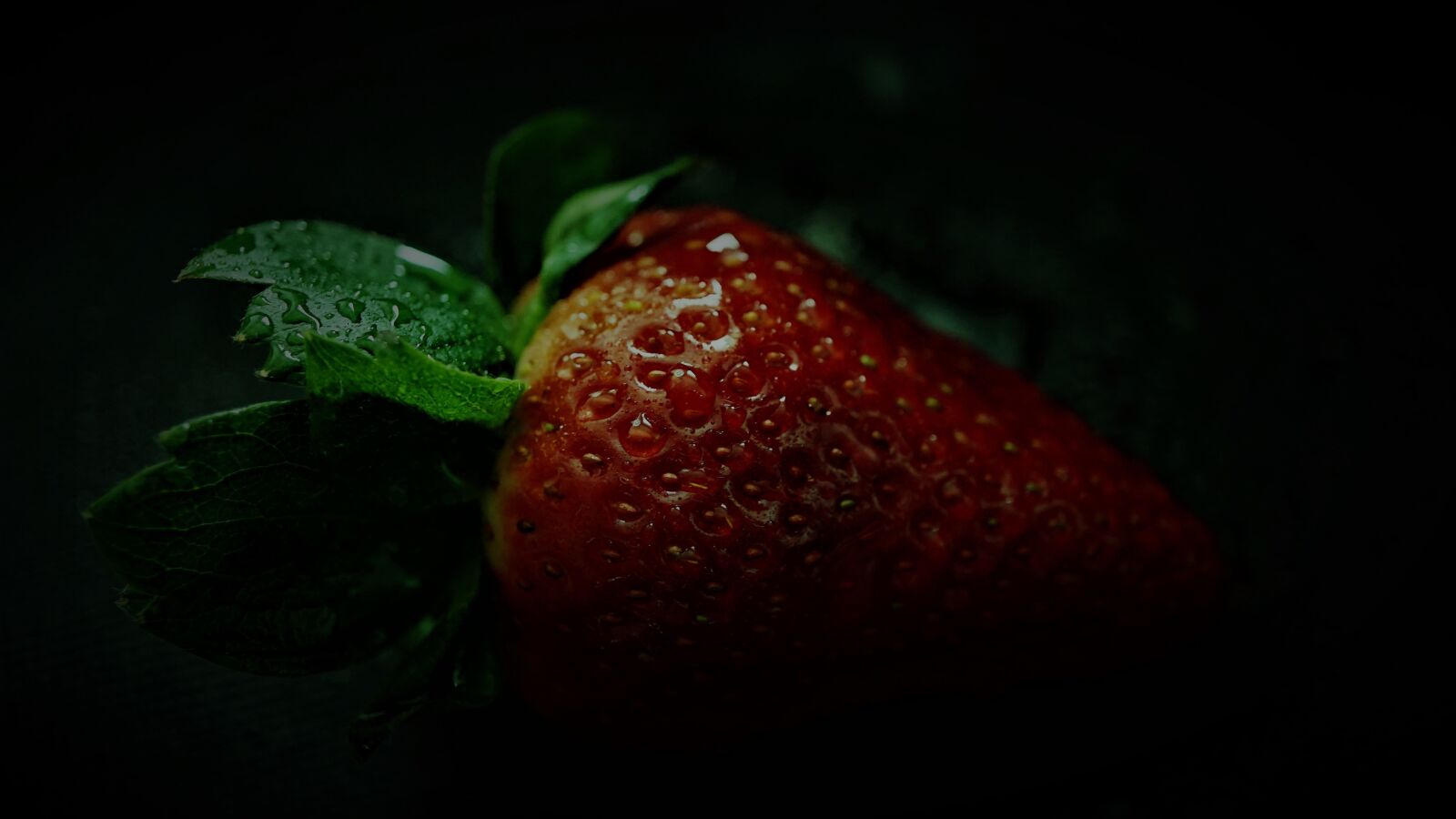 Sony E 30mm F3.5 Macro sample photo. Strawberry, background, black photography