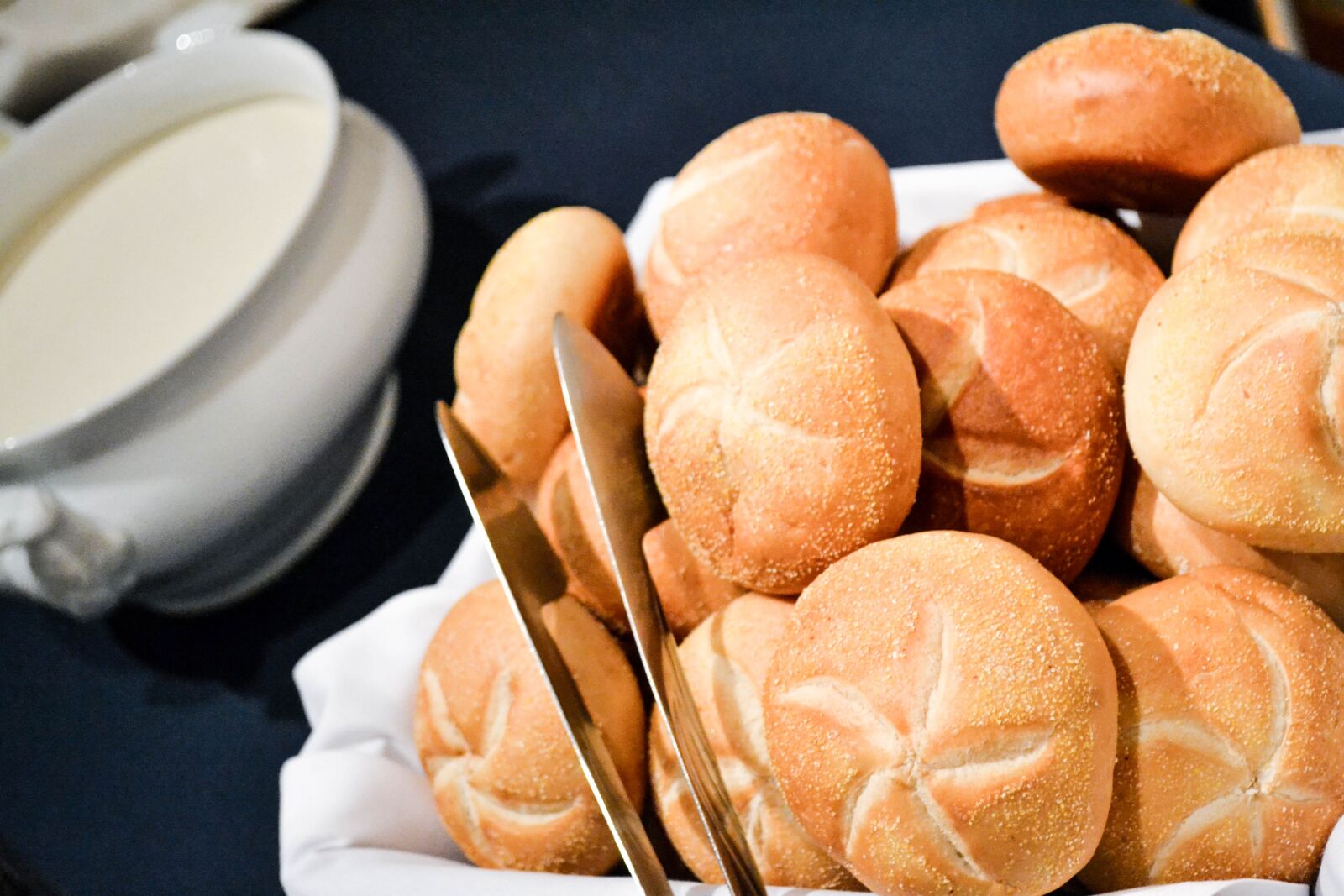 Nikon D3100 sample photo. Rolls, kaiser rolls, catering photography