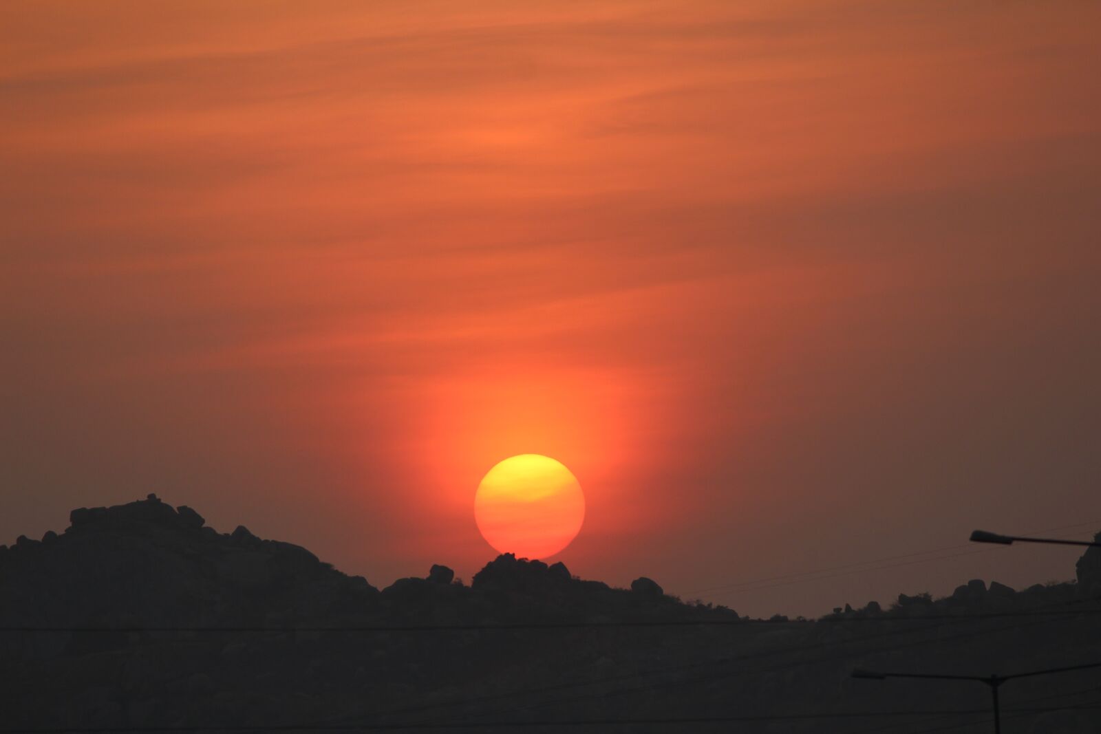 Canon EOS 1200D (EOS Rebel T5 / EOS Kiss X70 / EOS Hi) sample photo. Sunset, hills, sun photography
