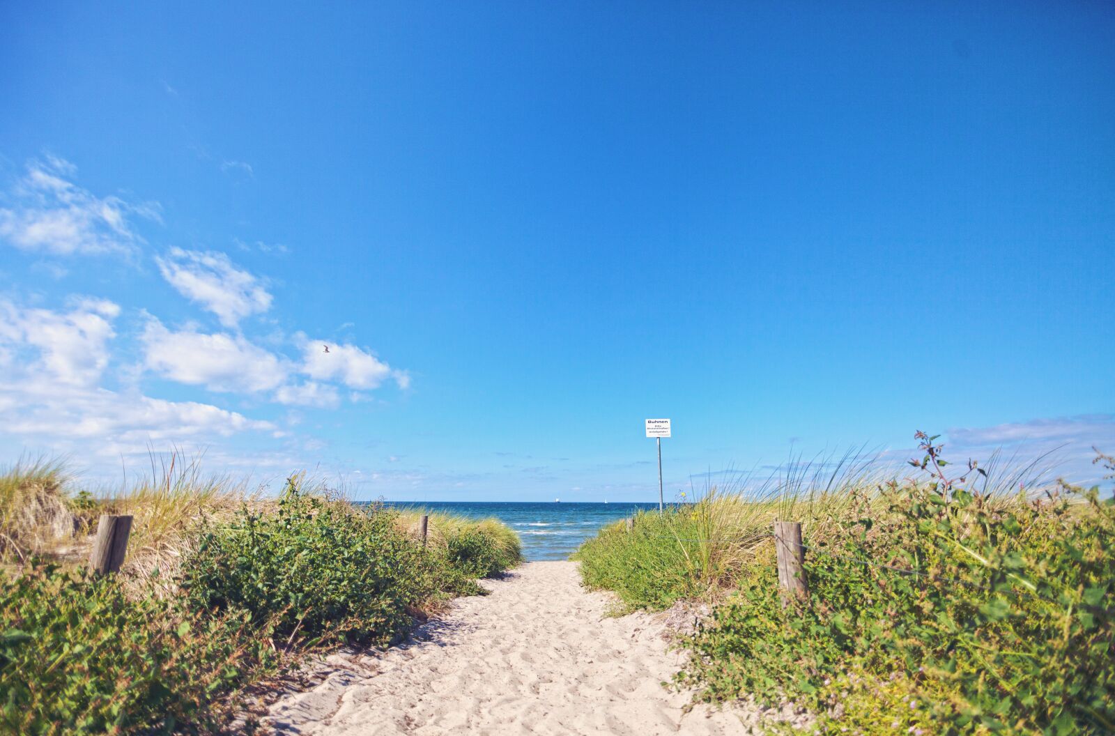 Tokina AT-X Pro 11-16mm F2.8 DX II sample photo. Sea, dunes, beach photography
