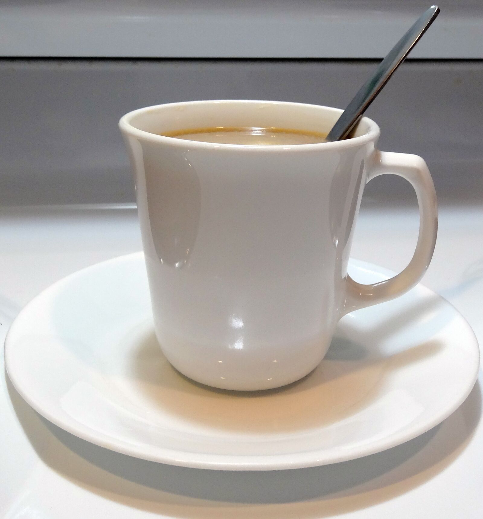 Sony Cyber-shot DSC-HX20V sample photo. Coffee cup, coffee, spoon photography