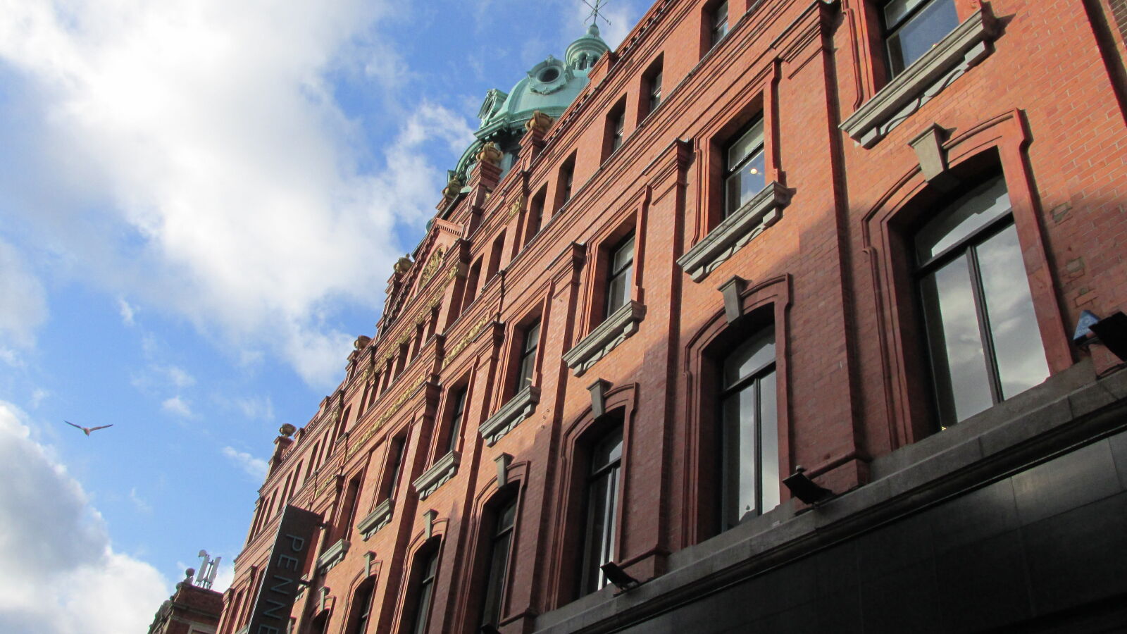 Canon PowerShot SX170 IS sample photo. Blue, brown, buildings, city photography