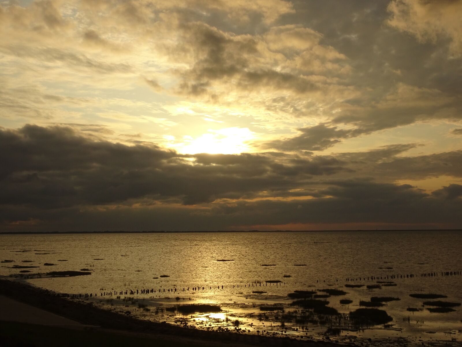 Sony Cyber-shot DSC-WX500 sample photo. Sunset, clouds, water photography