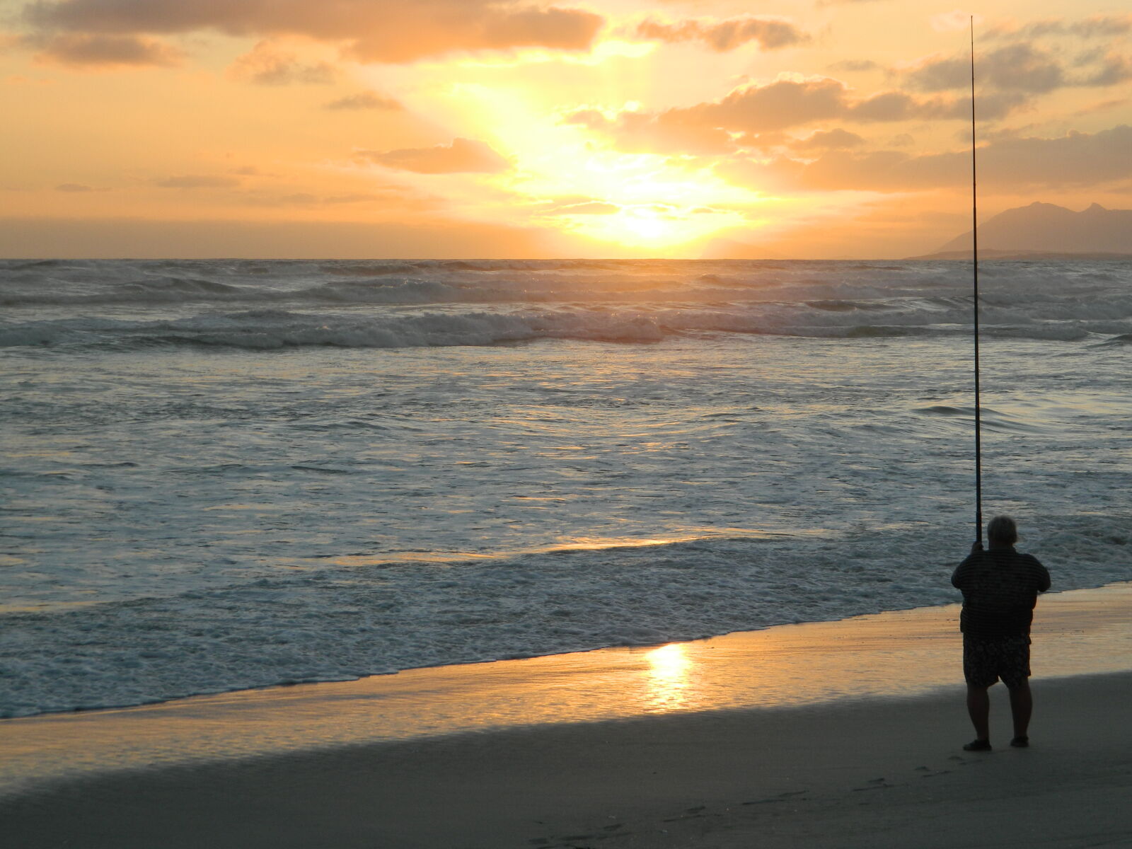 Nikon Coolpix L120 sample photo. Fisherman, at, sunset photography