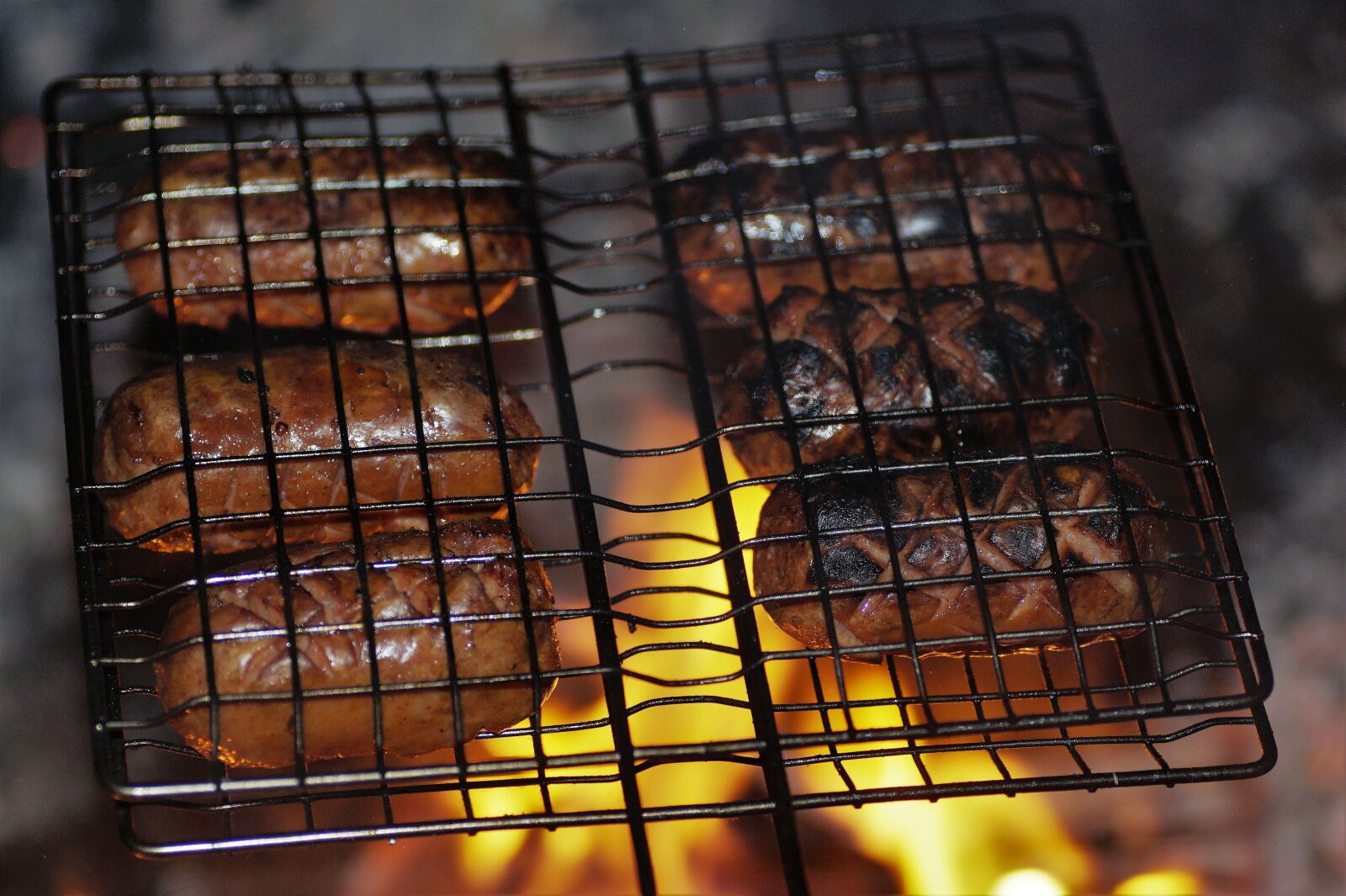 Sony SLT-A58 sample photo. Toasting, sausages, fire photography