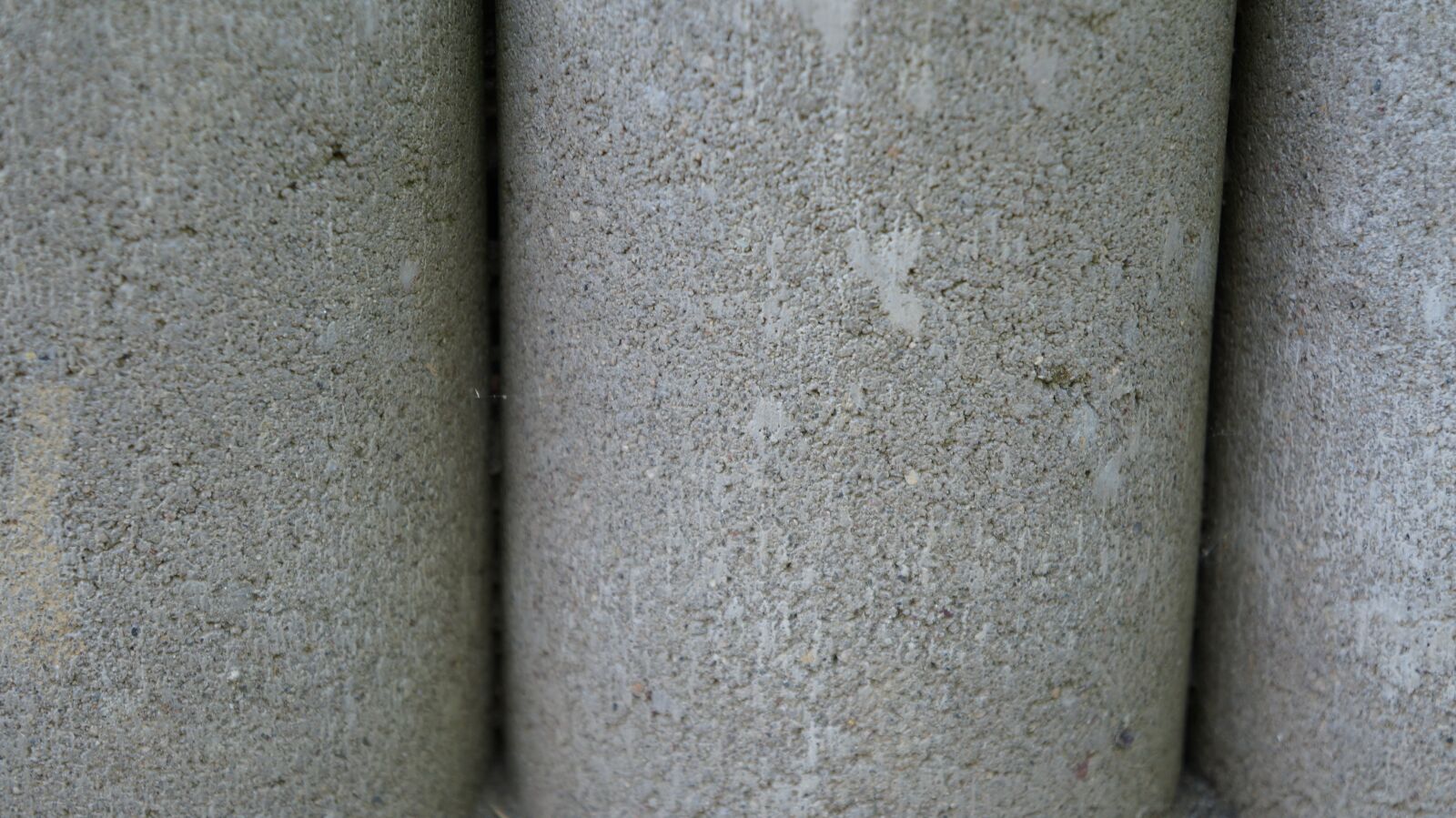 Sony Alpha a3000 + Sony E 18-55mm F3.5-5.6 OSS sample photo. Stones, grey, wall photography