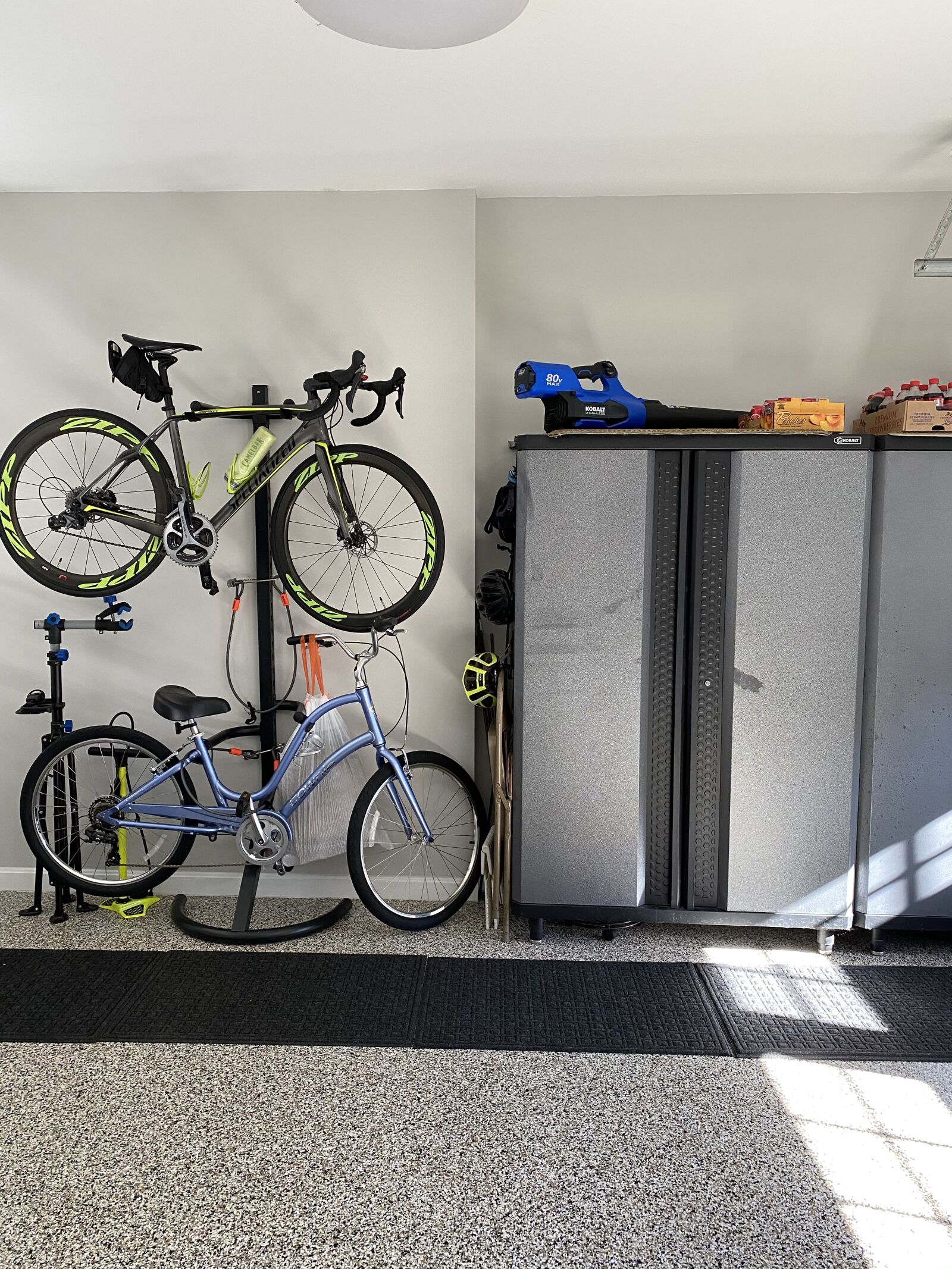 Apple iPhone 11 + iPhone 11 back dual wide camera 4.25mm f/1.8 sample photo. Bicycle, hanging, garage photography