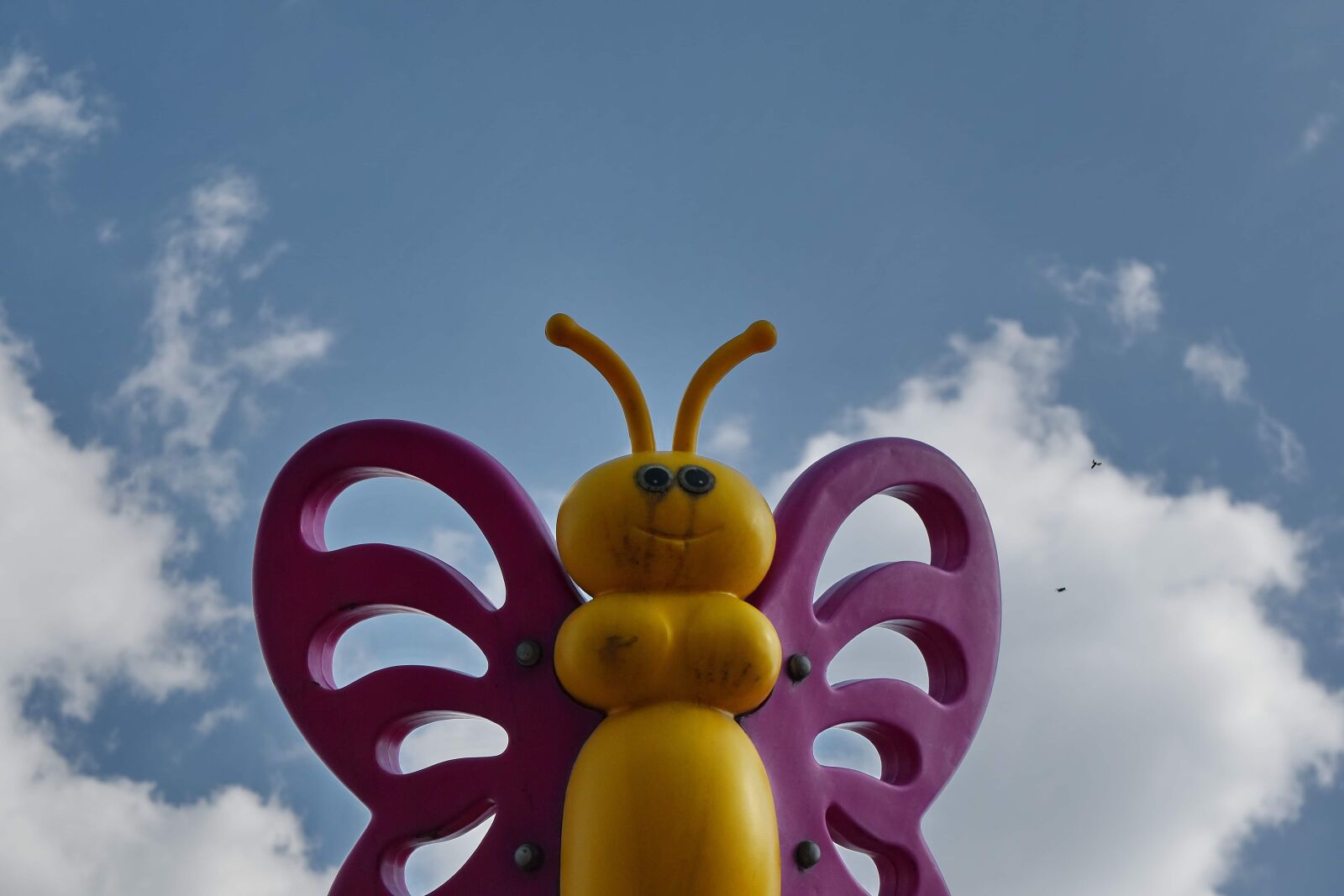 Nikon D5500 sample photo. Blue sky, butterfly, plastic photography