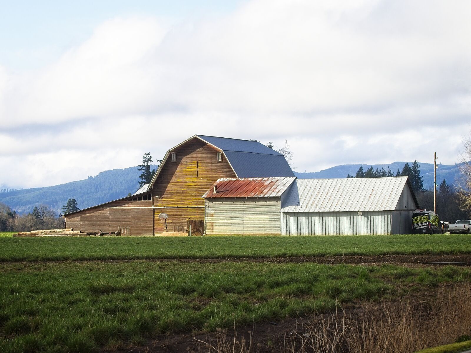Olympus OM-D E-M1 sample photo. Field, barn, sky photography