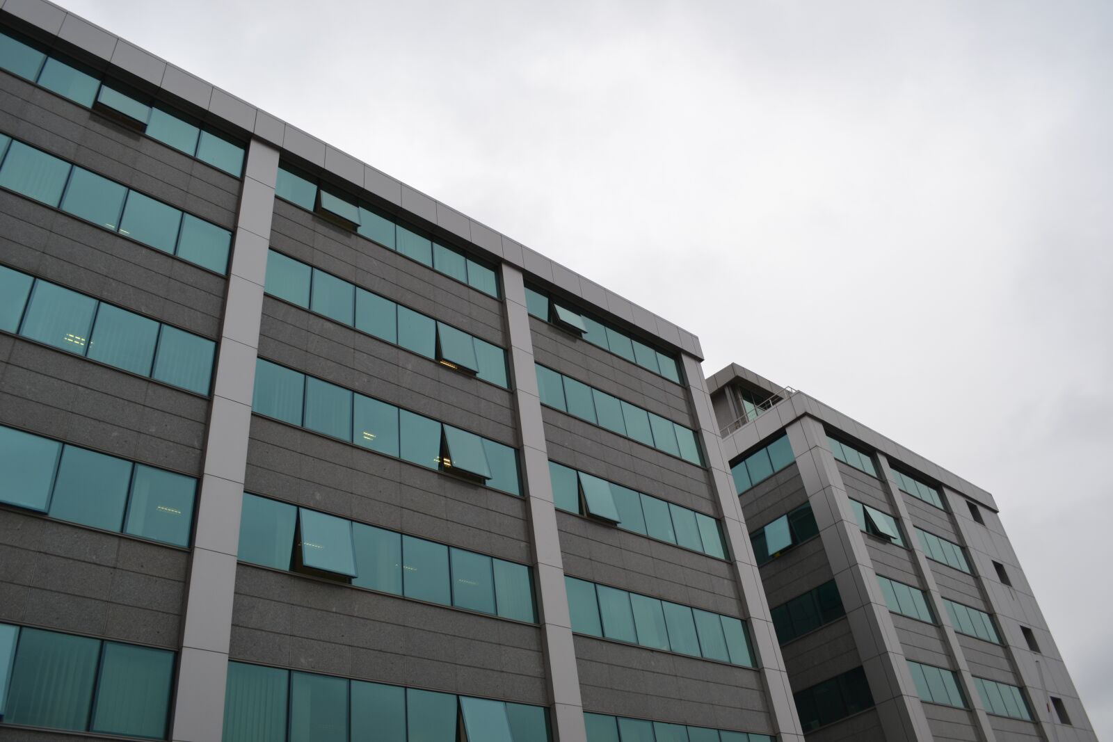 Nikon D3100 sample photo. Building, sky, bank photography