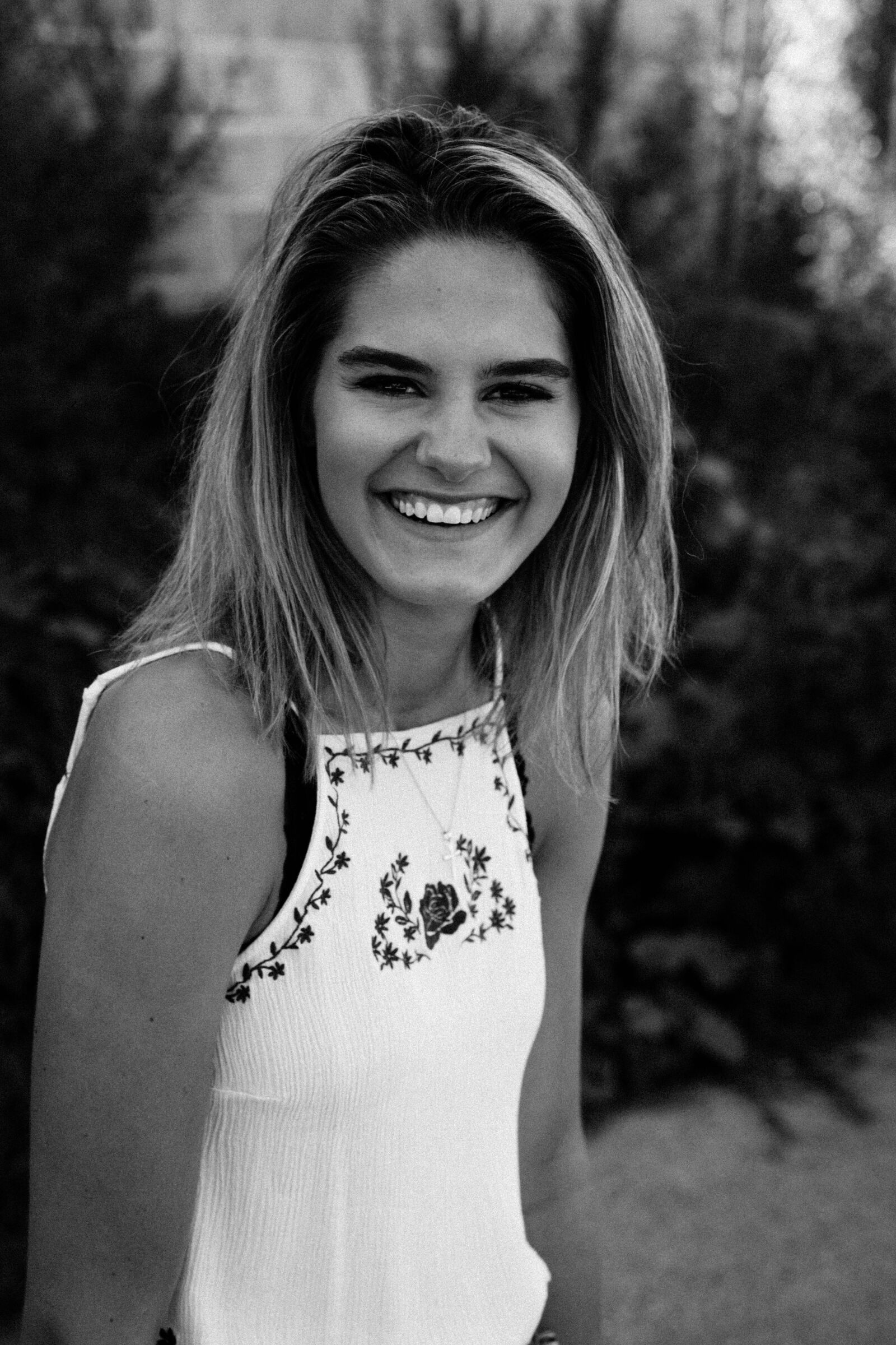 E 50mm F1.8 OSS sample photo. Black and white, dress photography
