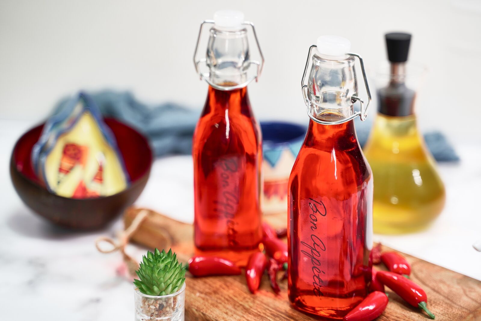 Tamron 28-75mm F2.8 Di III RXD sample photo. Chili oil, oil, herb photography