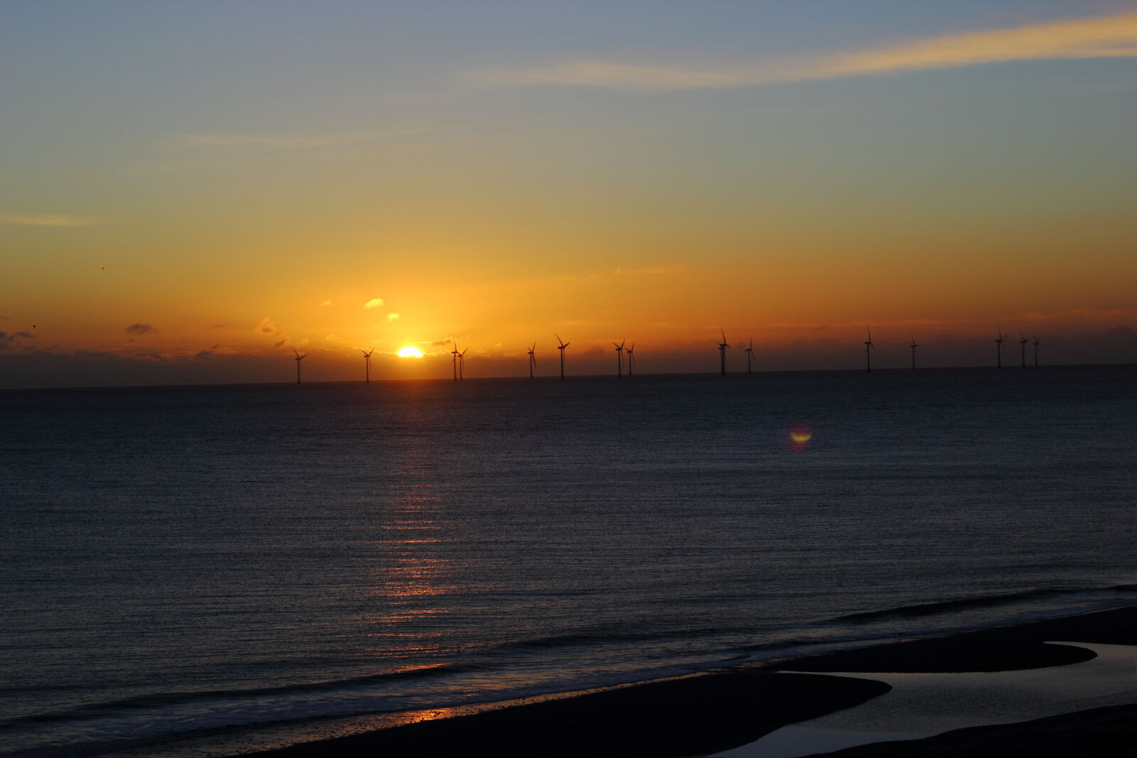 Canon EOS 550D (EOS Rebel T2i / EOS Kiss X4) sample photo. Sea, beach, sunrise, windfarm photography