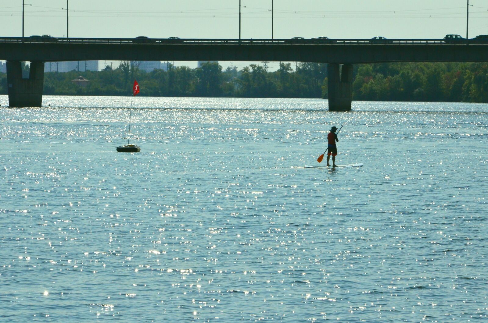 Nikon D5100 sample photo. River, bridge, the boatman photography