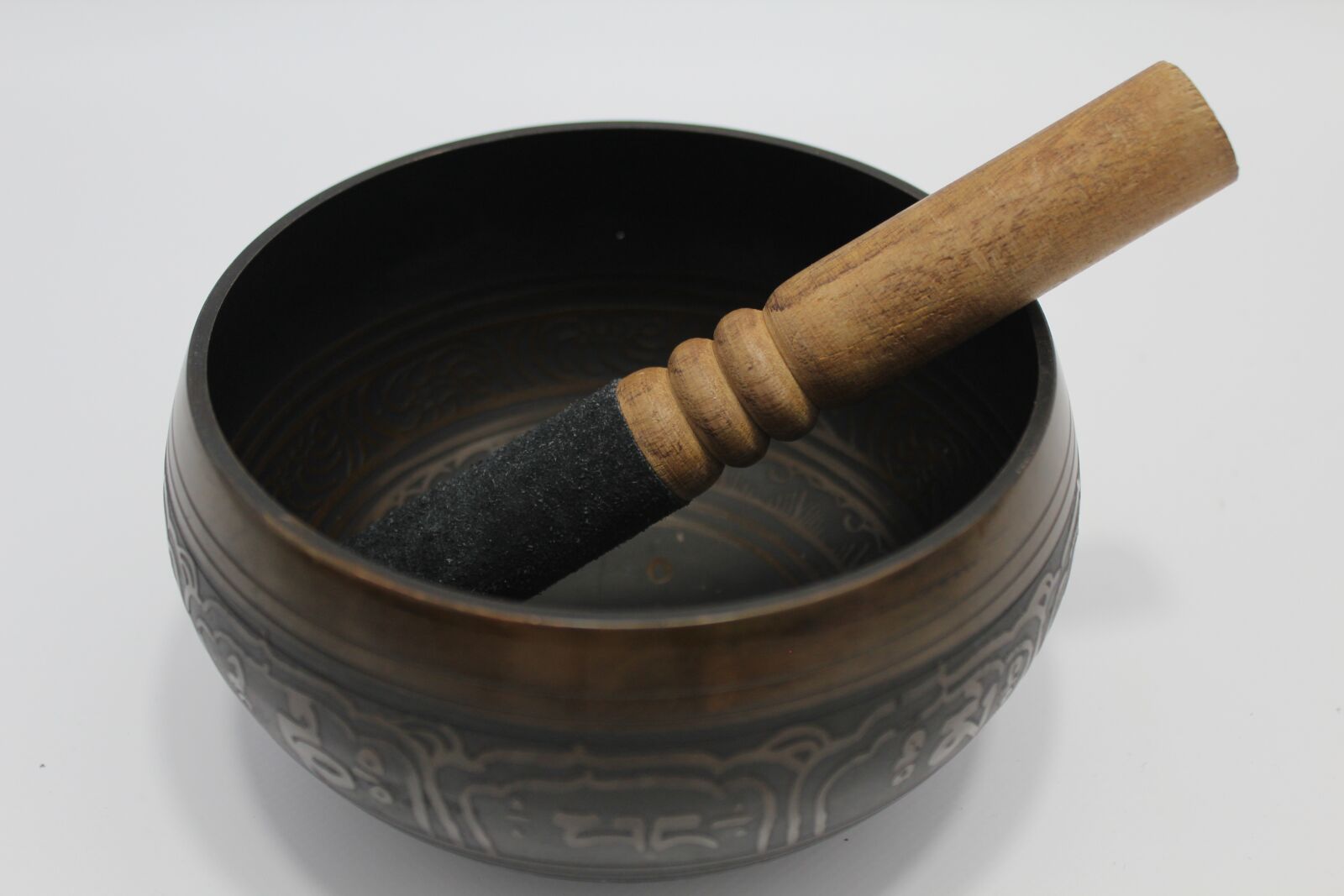 Canon EOS 1200D (EOS Rebel T5 / EOS Kiss X70 / EOS Hi) sample photo. Tibetan singing bowl stick photography