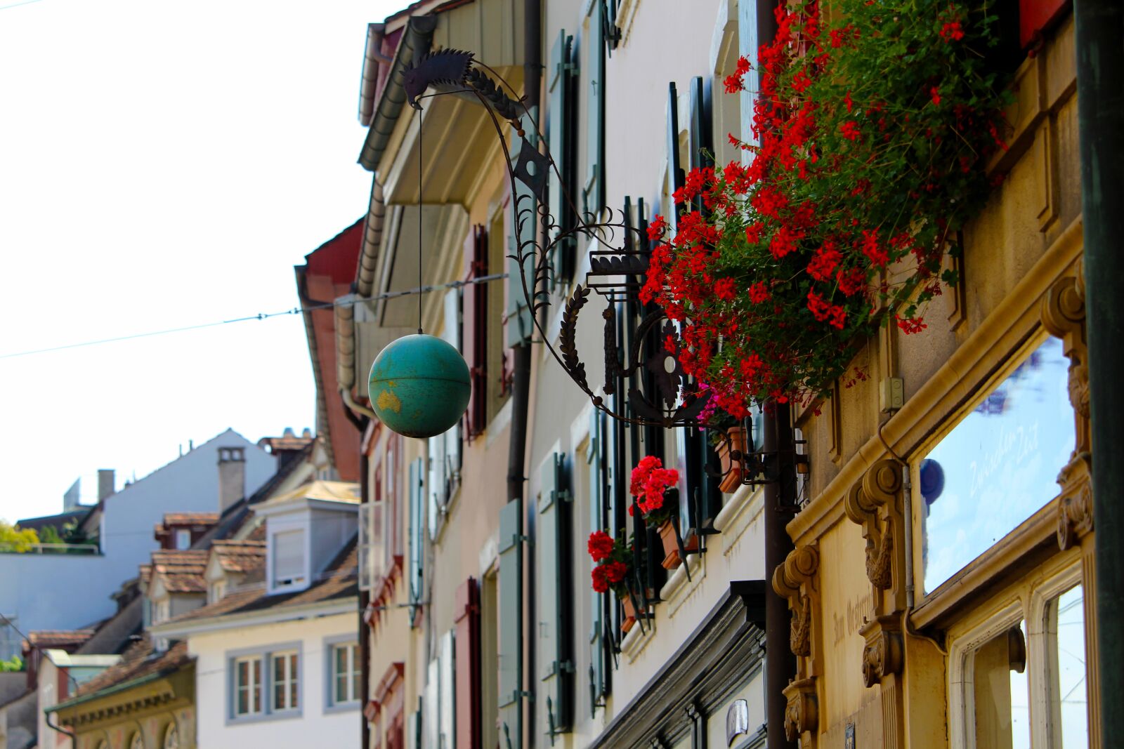 Canon EF-S 55-250mm F4-5.6 IS STM sample photo. Basel, facade, business signs photography