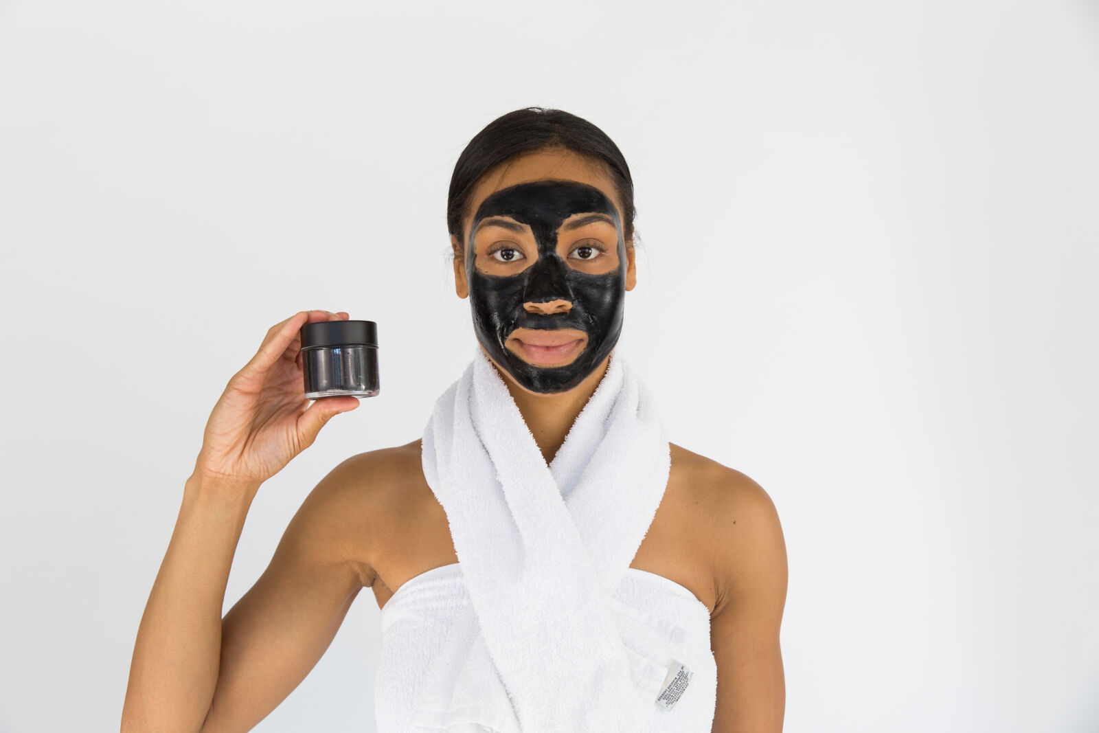Canon EF 24-70mm F2.8L II USM sample photo. Woman, holding, black, mask photography