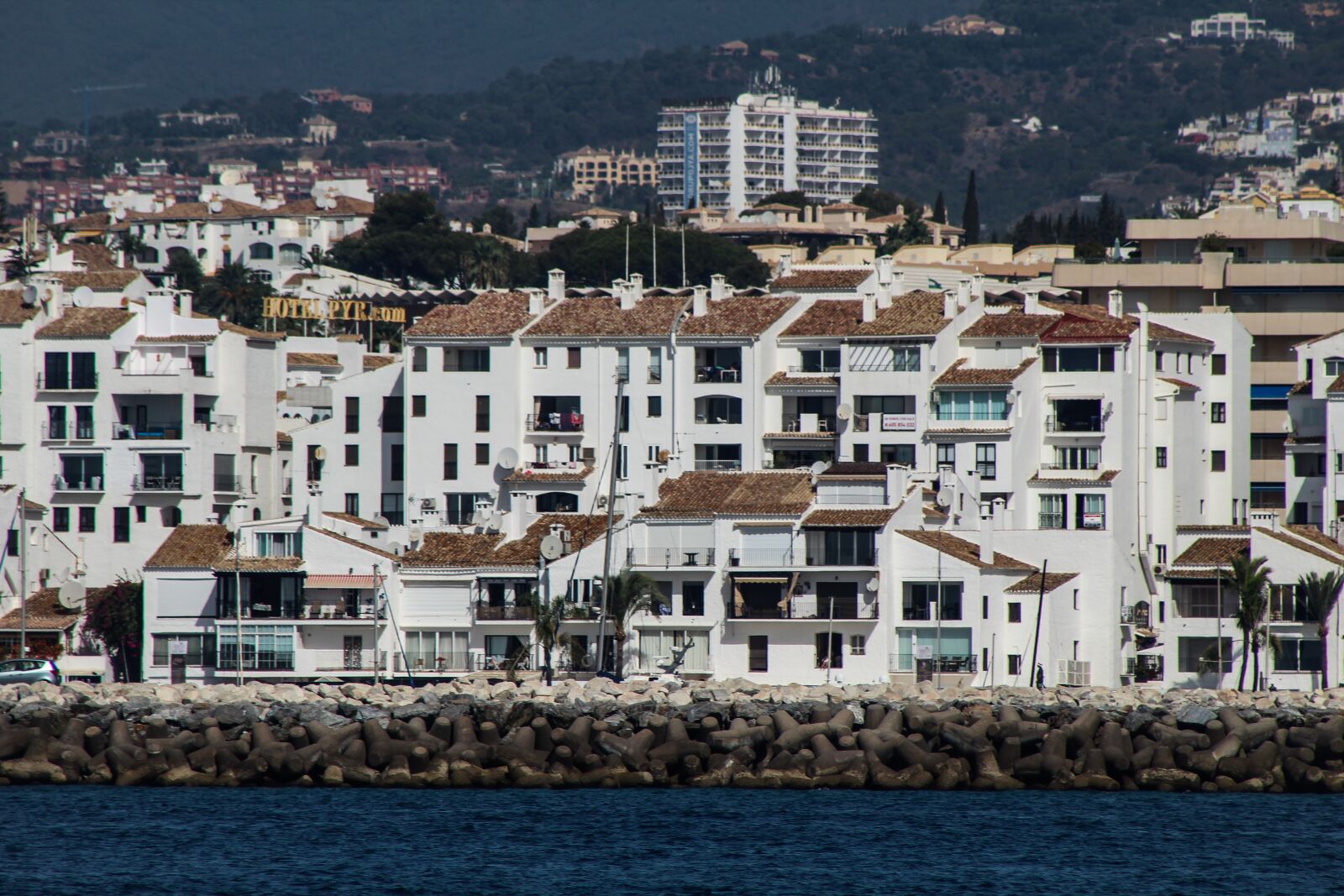 Canon EF 75-300mm f/4-5.6 sample photo. Sea, boat, ocean photography