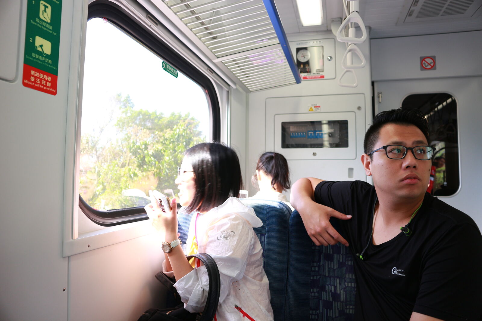 Canon EOS M sample photo. People, in, bus photography