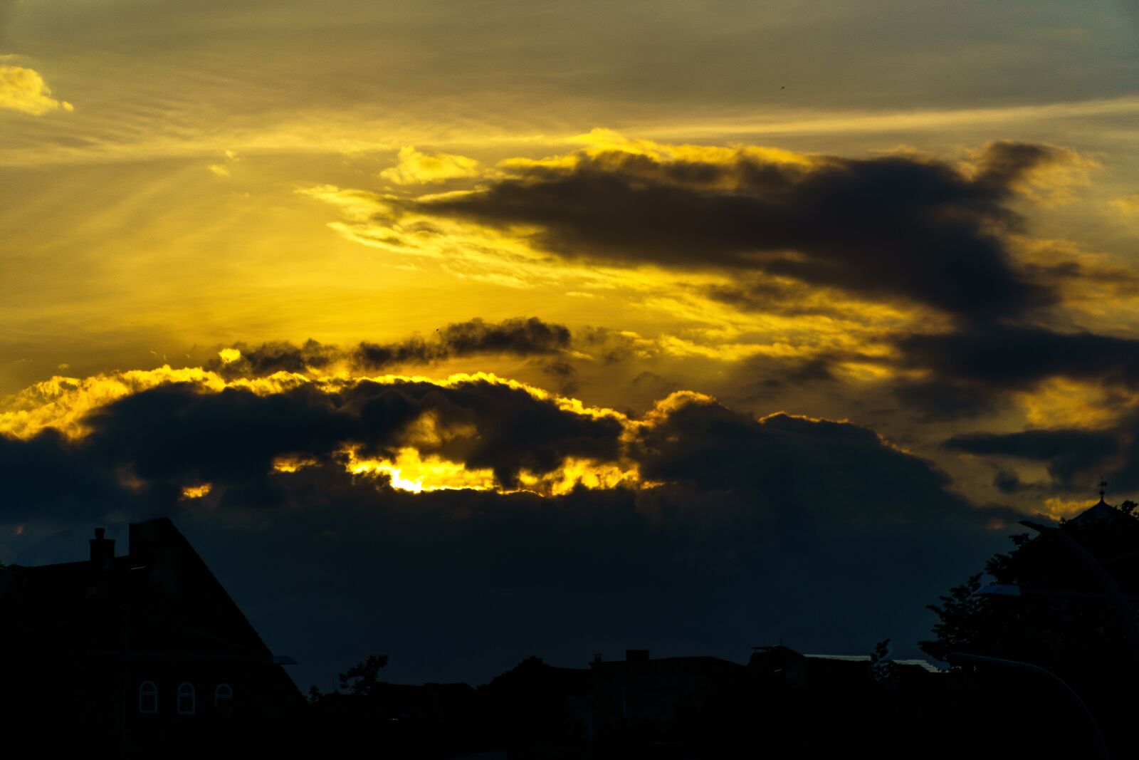 Sony a6000 + Sony E PZ 18-105mm F4 G OSS sample photo. Sunset, kappeln, clouds photography