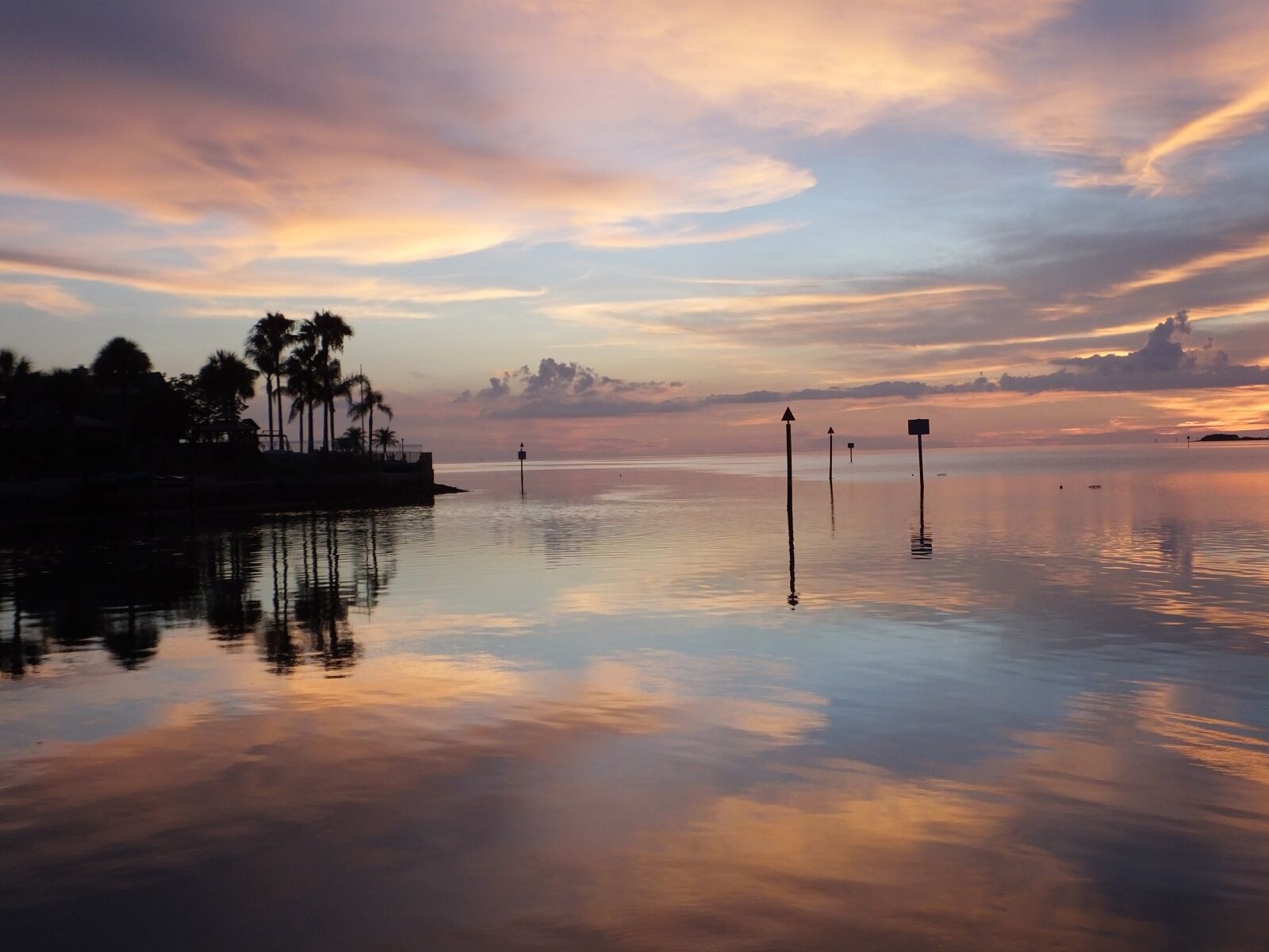 Fujifilm FinePix HS50 EXR sample photo. Sunset, reflections, sea photography