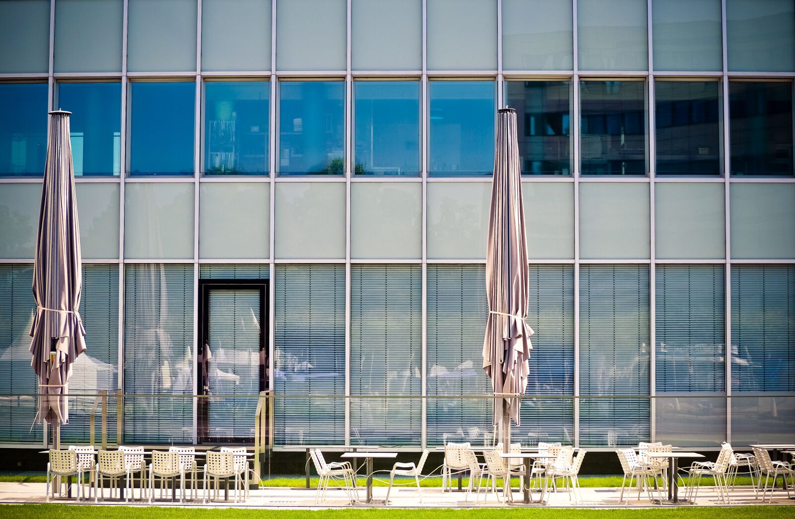 Olympus OM-D E-M10 sample photo. Architecture, chairs, building photography