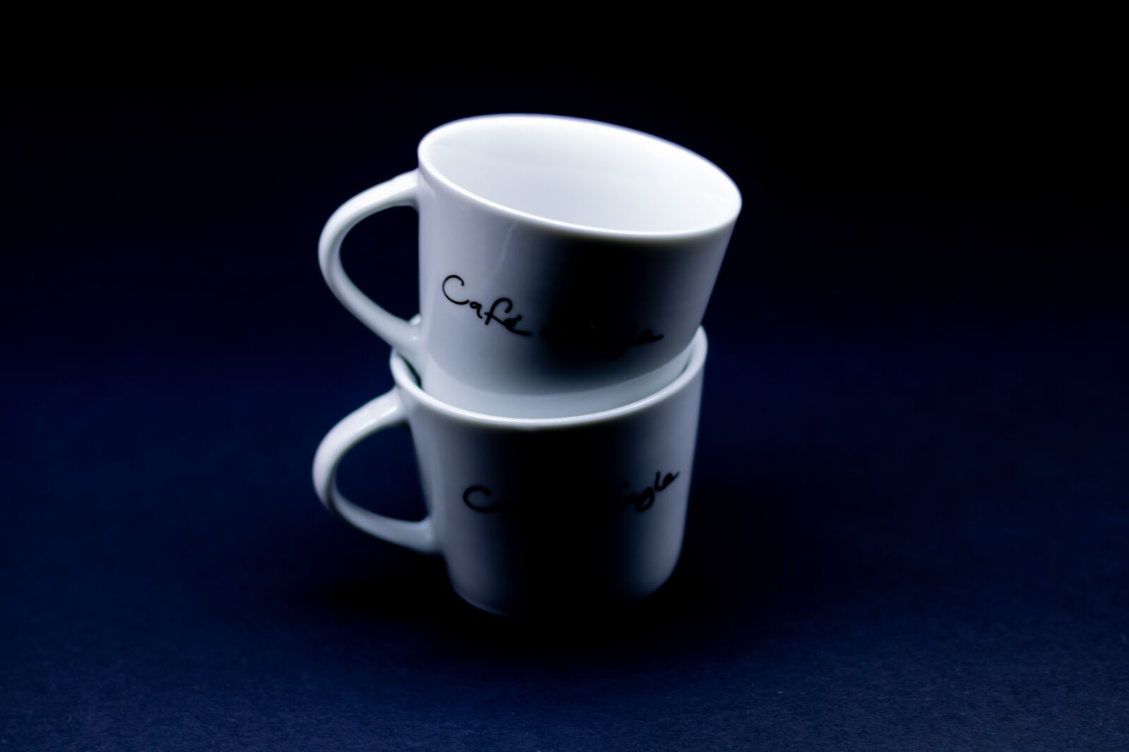 Canon EOS 2000D (EOS Rebel T7 / EOS Kiss X90 / EOS 1500D) + Canon EF 50mm F1.8 STM sample photo. Coffee mugs, black background photography