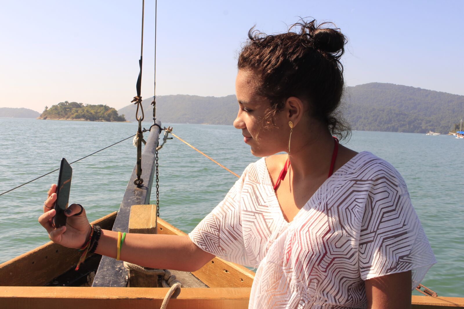 Canon EOS 700D (EOS Rebel T5i / EOS Kiss X7i) sample photo. Girl, boat, ocean photography