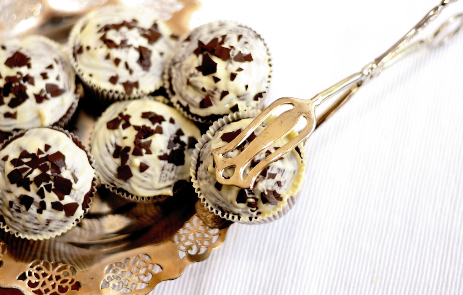 Nikon D610 sample photo. Muffins, pastries, pastry tongs photography