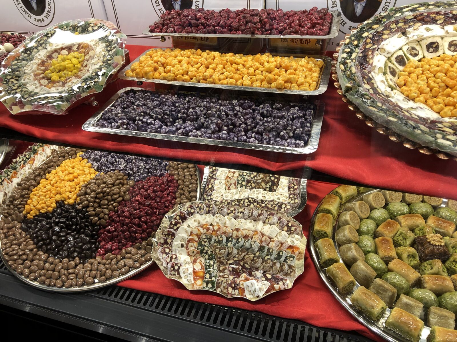 iPhone 8 Plus back dual camera 3.99mm f/1.8 sample photo. Dubai, mall, arabic sweets photography