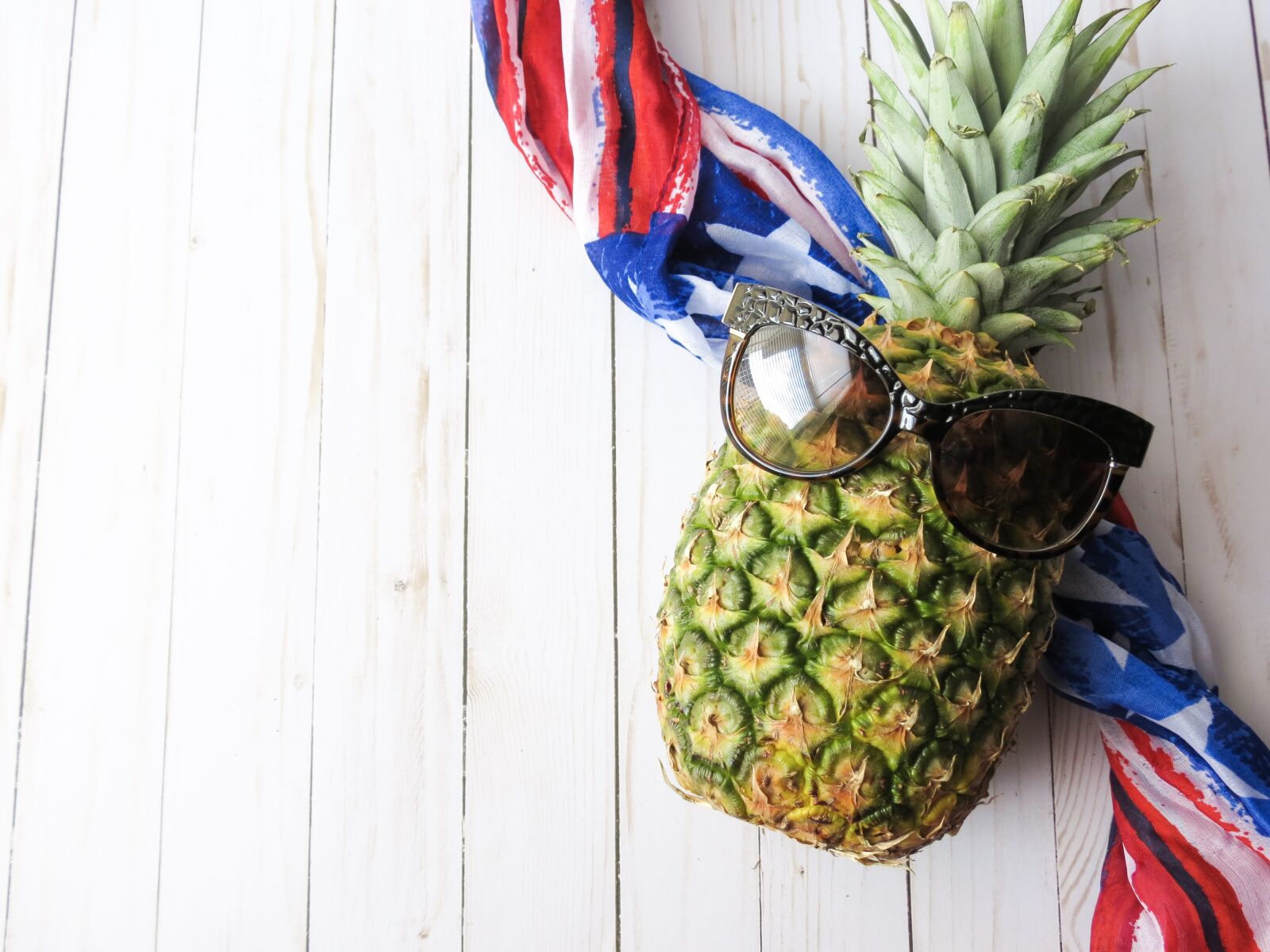Canon PowerShot SX40 HS sample photo. Fruit, pineapple, american flag photography