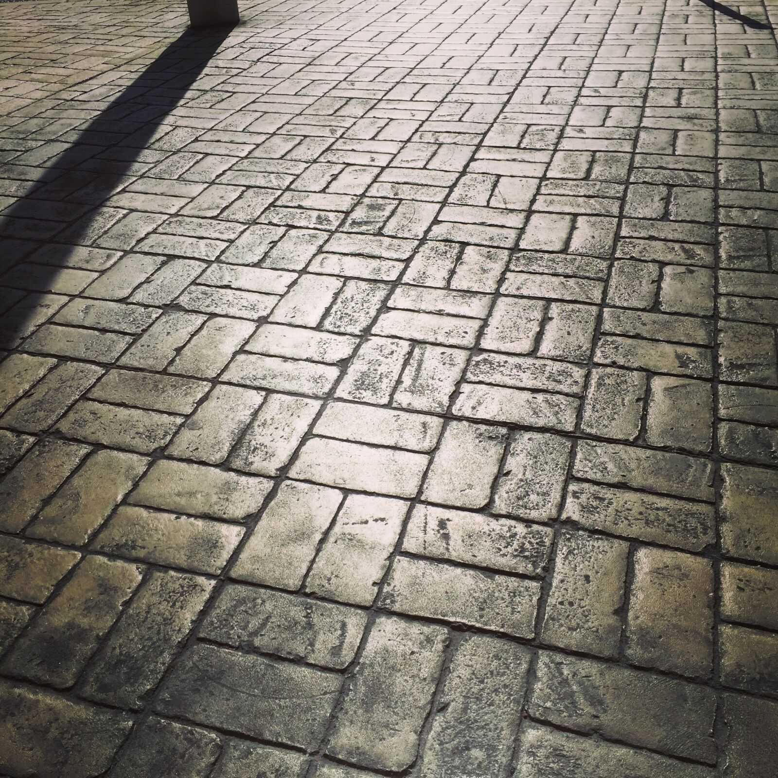 iPhone 6 Plus back camera 4.15mm f/2.2 sample photo. Cobbles, shadows, stone photography