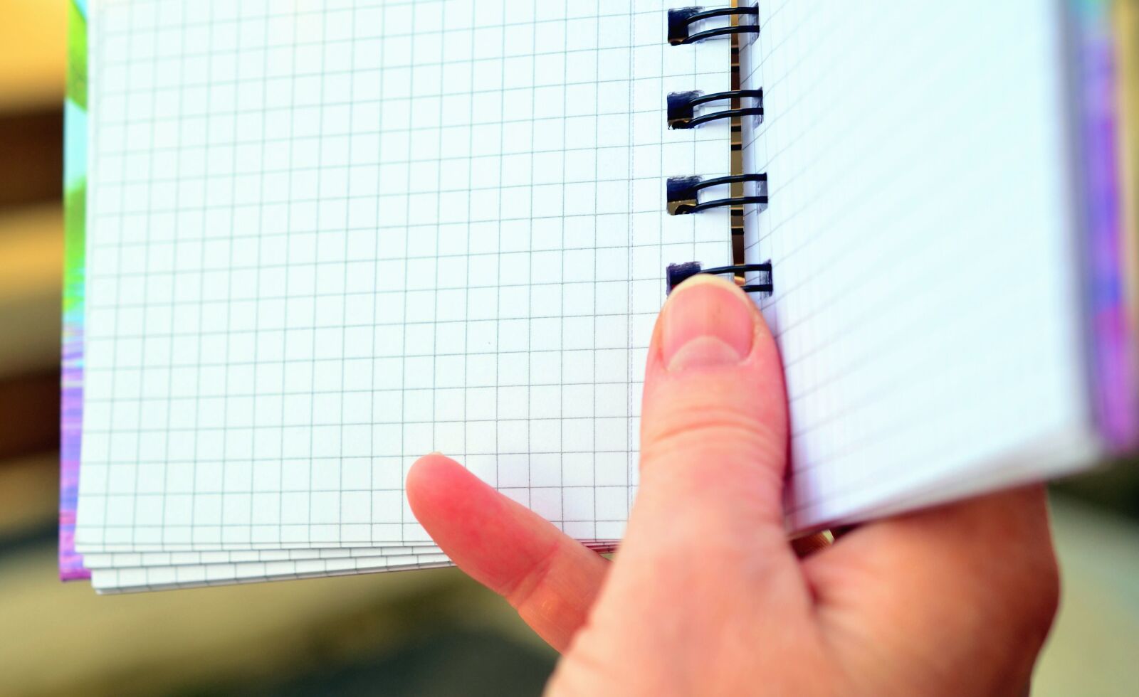 Nikon D5100 sample photo. Spiral, notes, finger, square photography
