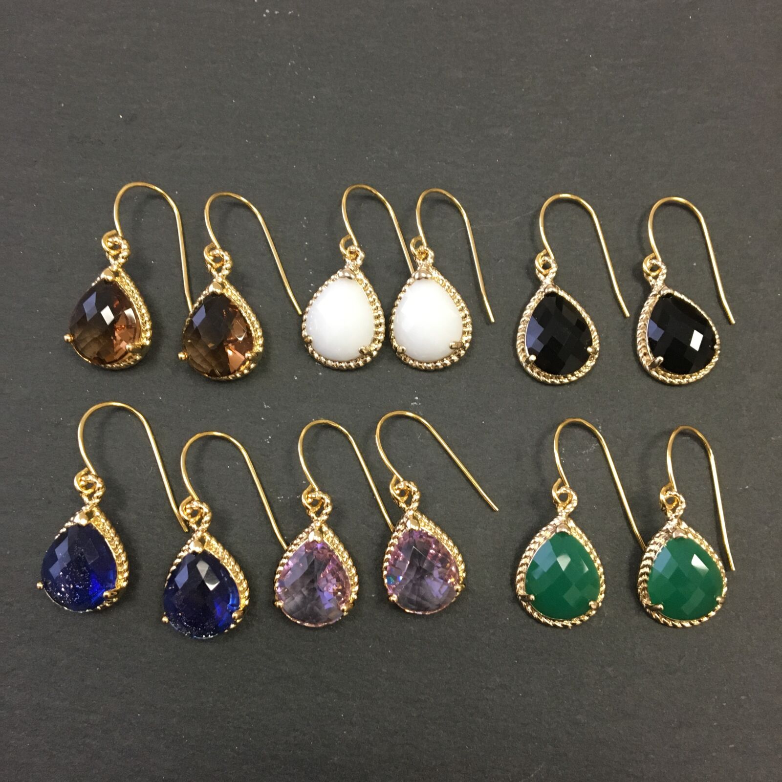 iPhone 6s back camera 4.15mm f/2.2 sample photo. Earrings, gold, jewellery photography