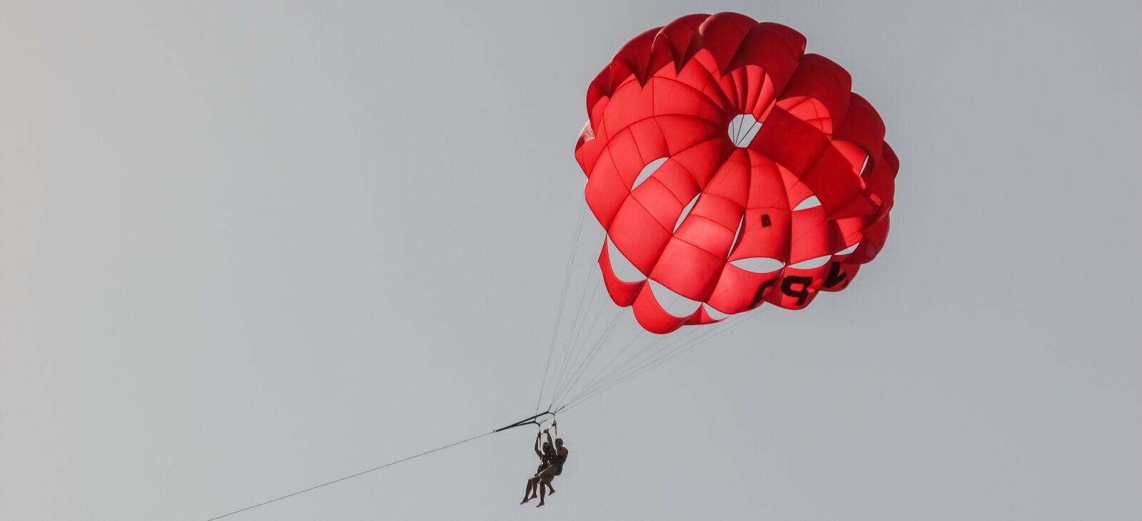 Canon PowerShot SX400 IS sample photo. Parachute, paragliding, red photography