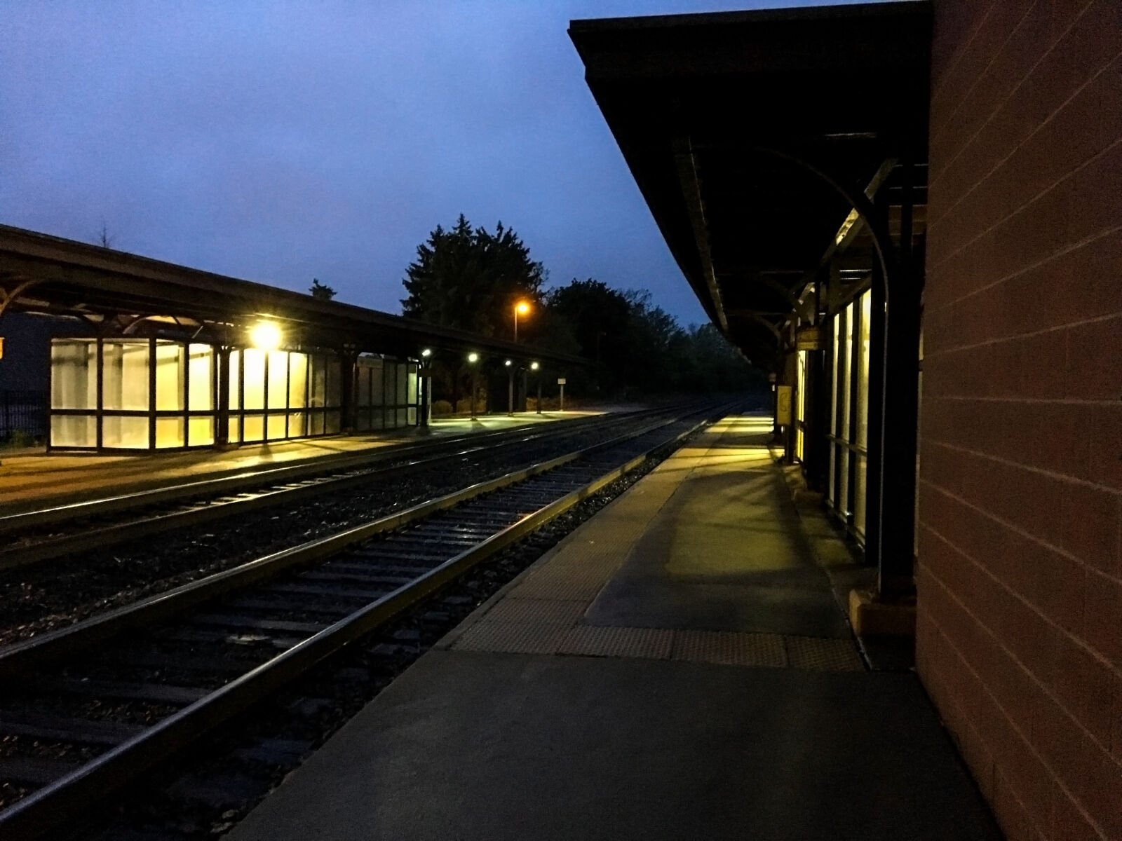 Apple iPhone 6s sample photo. Dark, lights, rain, train photography