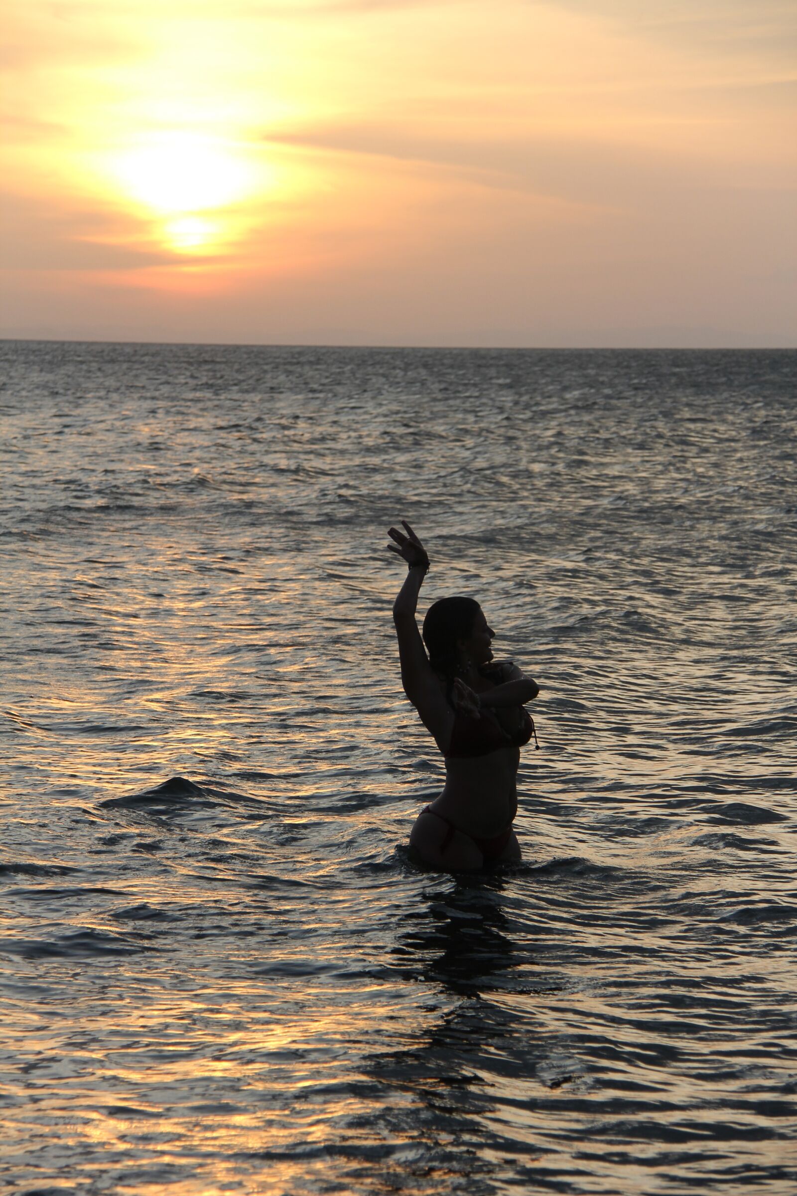 Canon EF-S 18-200mm F3.5-5.6 IS sample photo. Sea, water, person inside photography