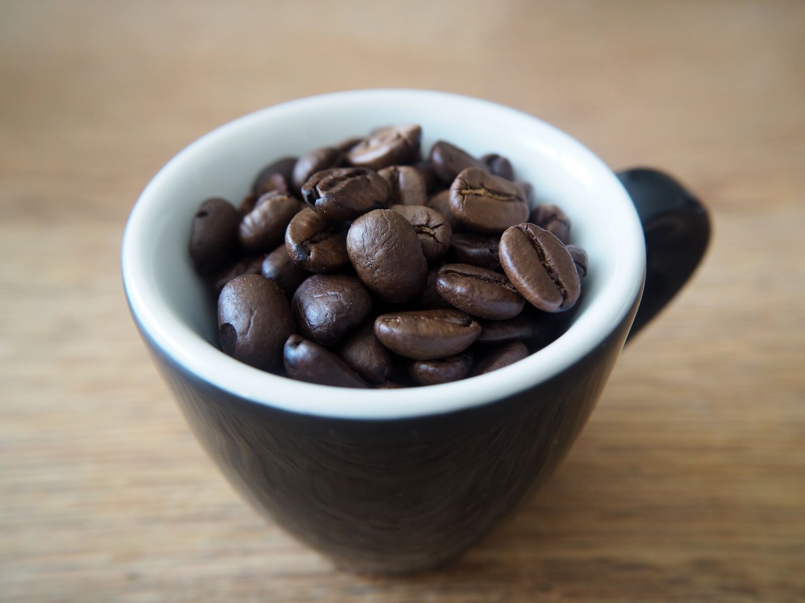 Olympus OM-D E-M10 sample photo. Coffee, coffee cup, beans photography