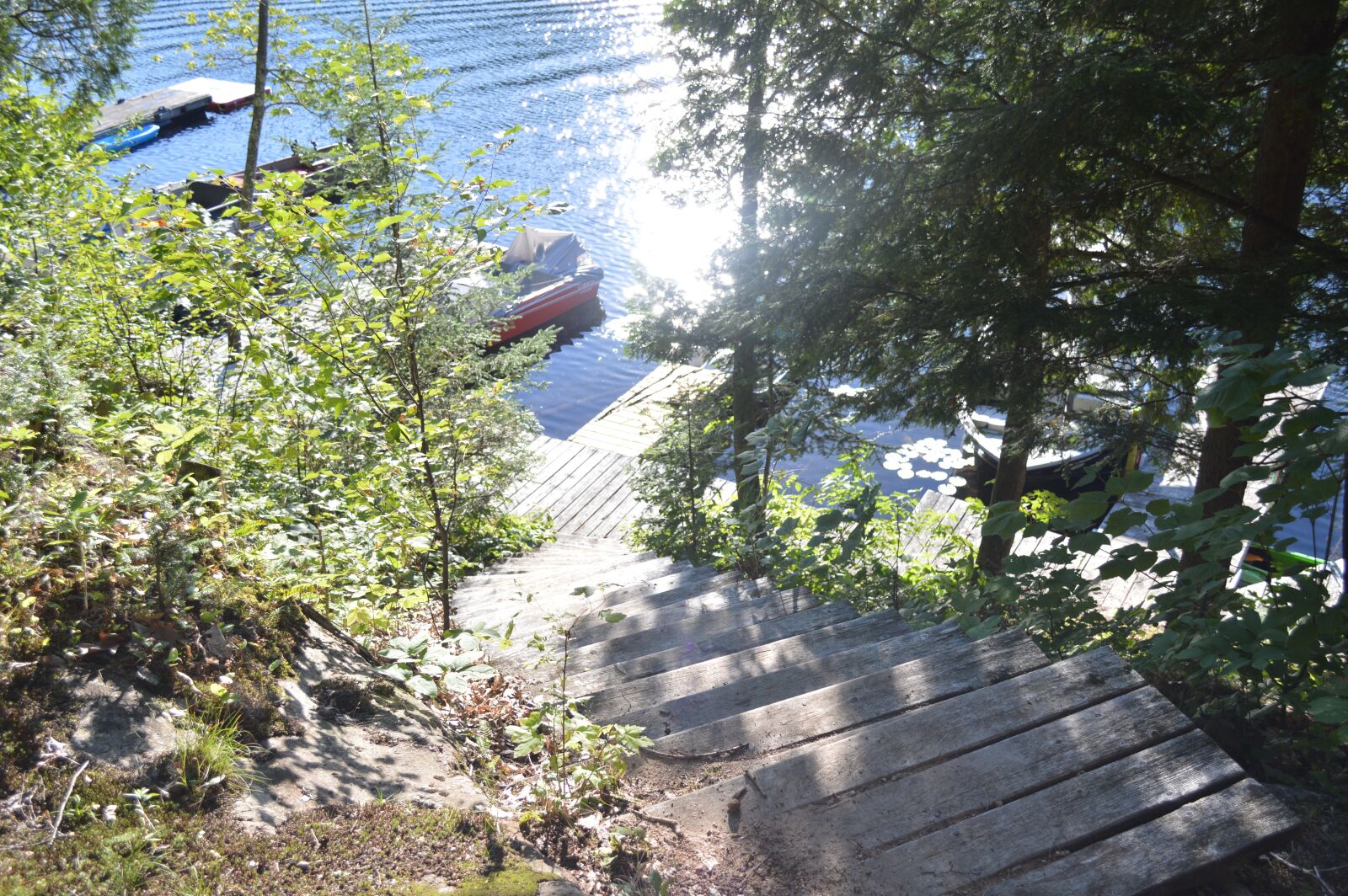 Nikon D3200 sample photo. Lake, dock, boats photography