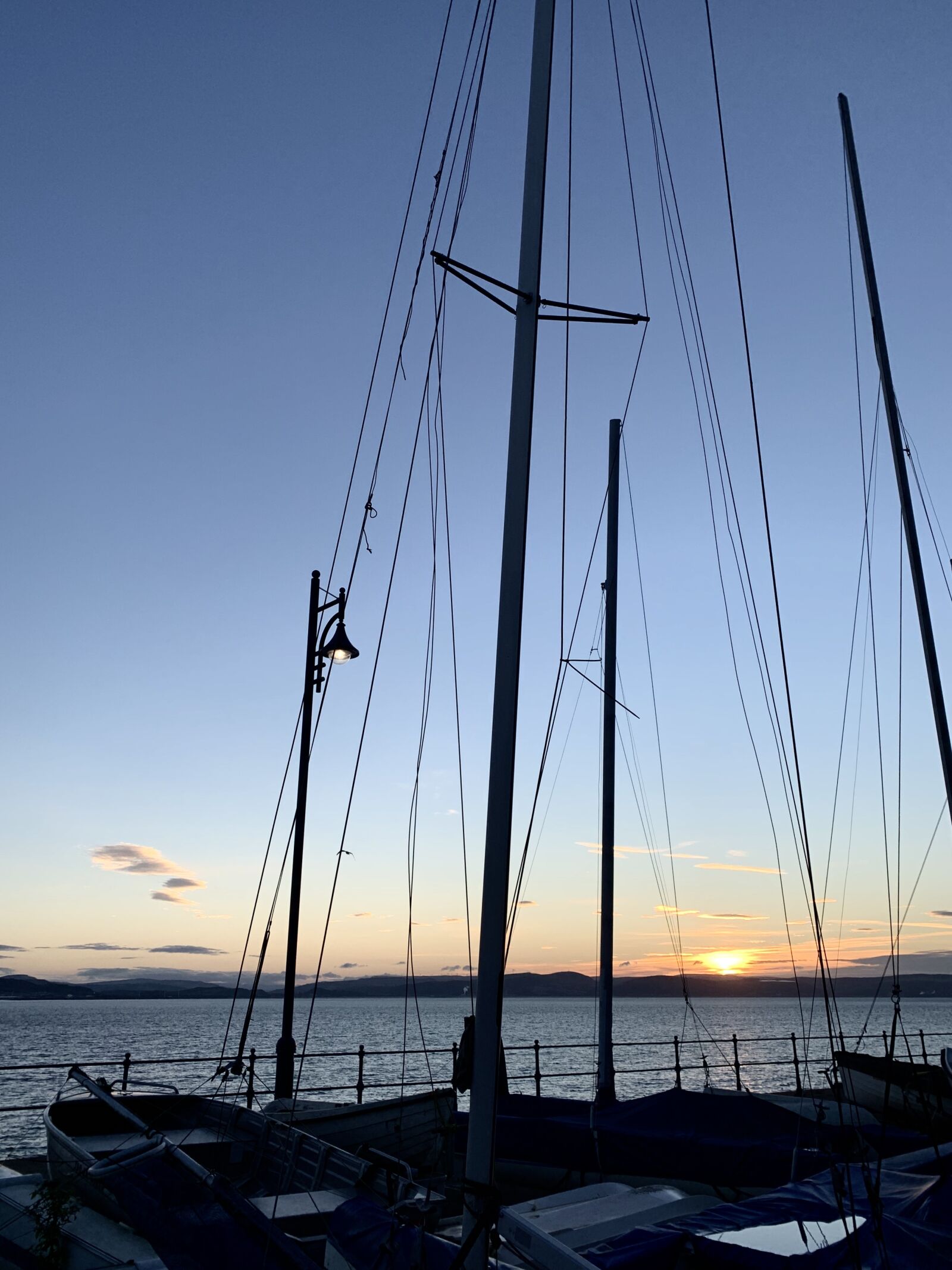 iPhone XS back dual camera 4.25mm f/1.8 sample photo. Sunrise, yacht, sea photography