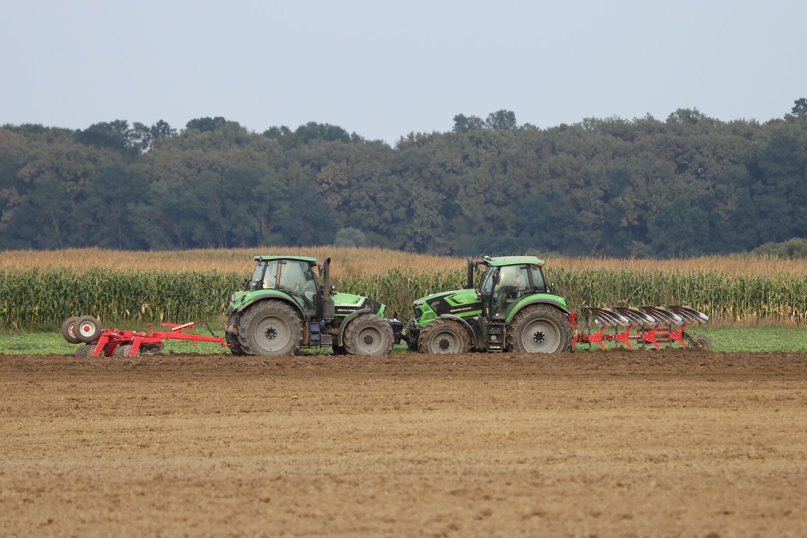 Canon EF 70-300 F4-5.6 IS II USM sample photo. Agriculture, two tractors, ploughed photography