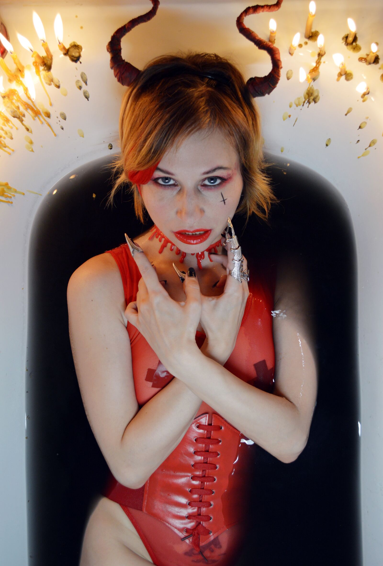 Nikon D3200 sample photo. Daemon, candles, black water photography