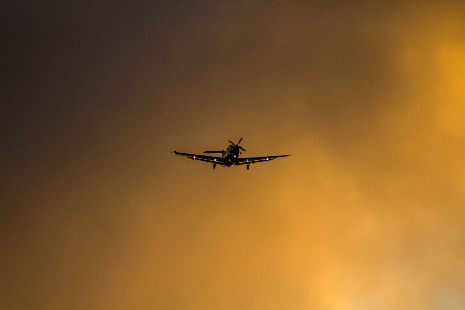 Canon EF 75-300mm f/4-5.6 sample photo. Canon, clouds, plane, sunrise photography