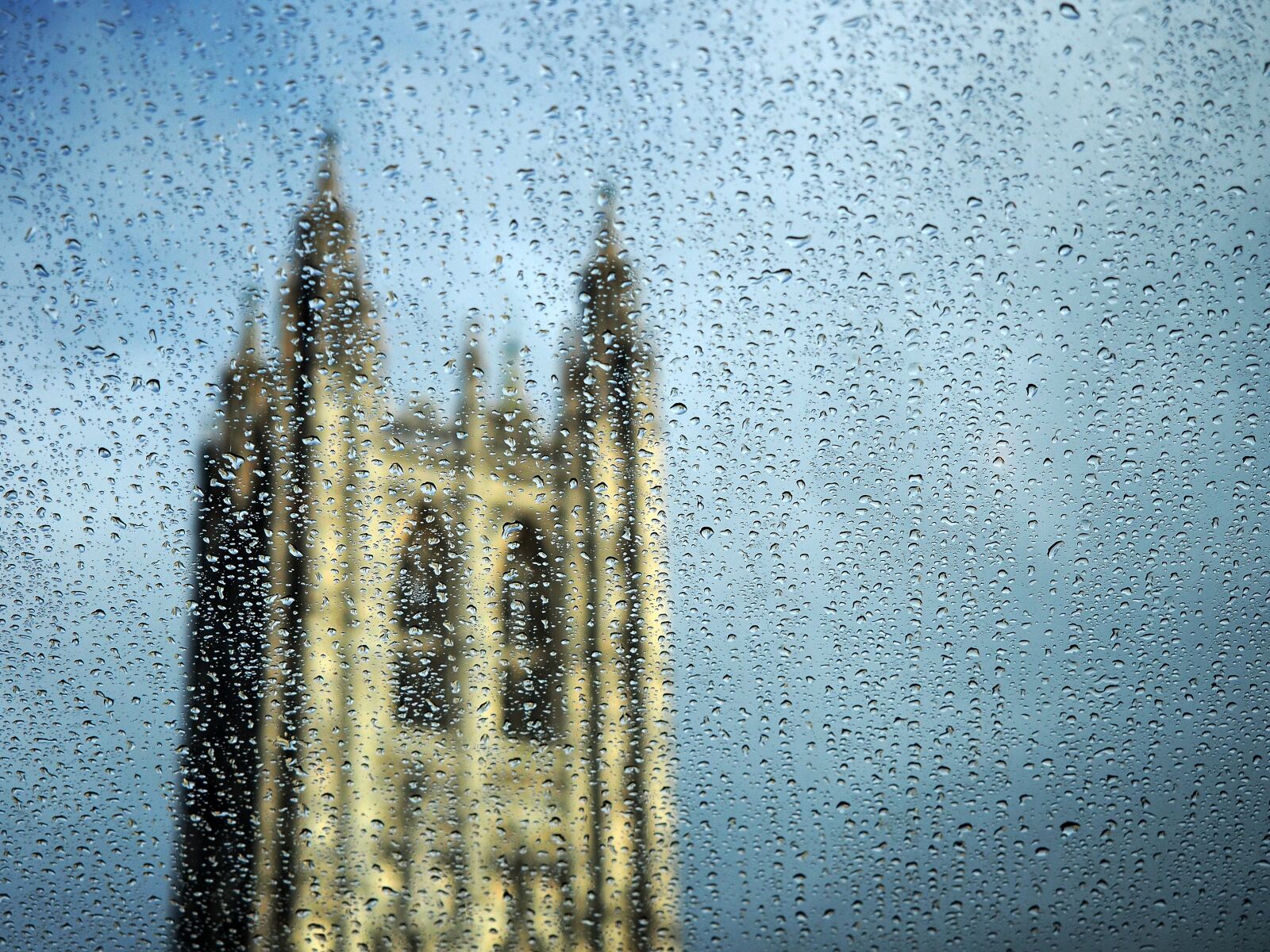 Olympus OM-D E-M5 sample photo. Cathedral, rain, tower photography