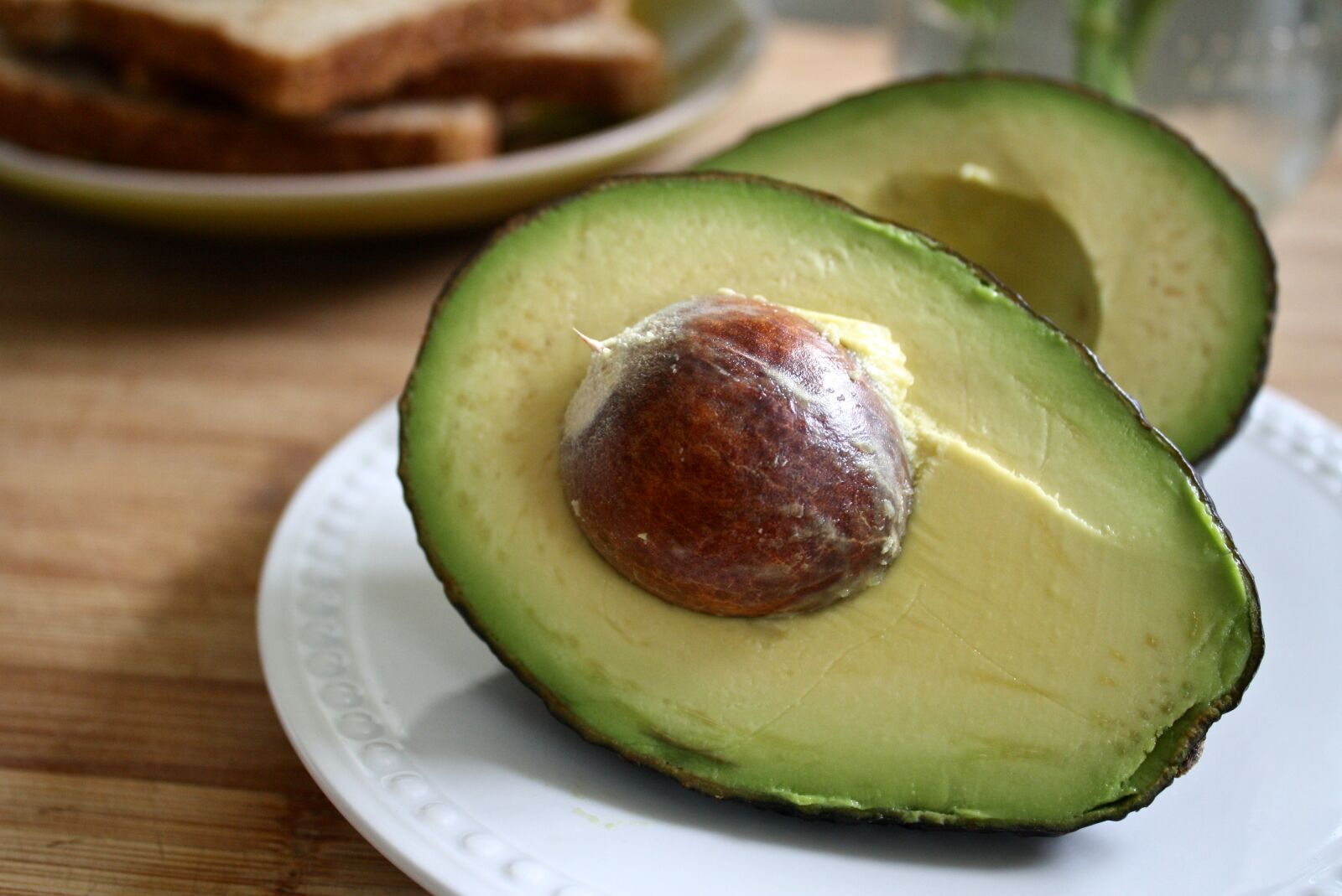 Canon EOS 1000D (EOS Digital Rebel XS / EOS Kiss F) sample photo. Breakfast, butter, sprouted bread photography