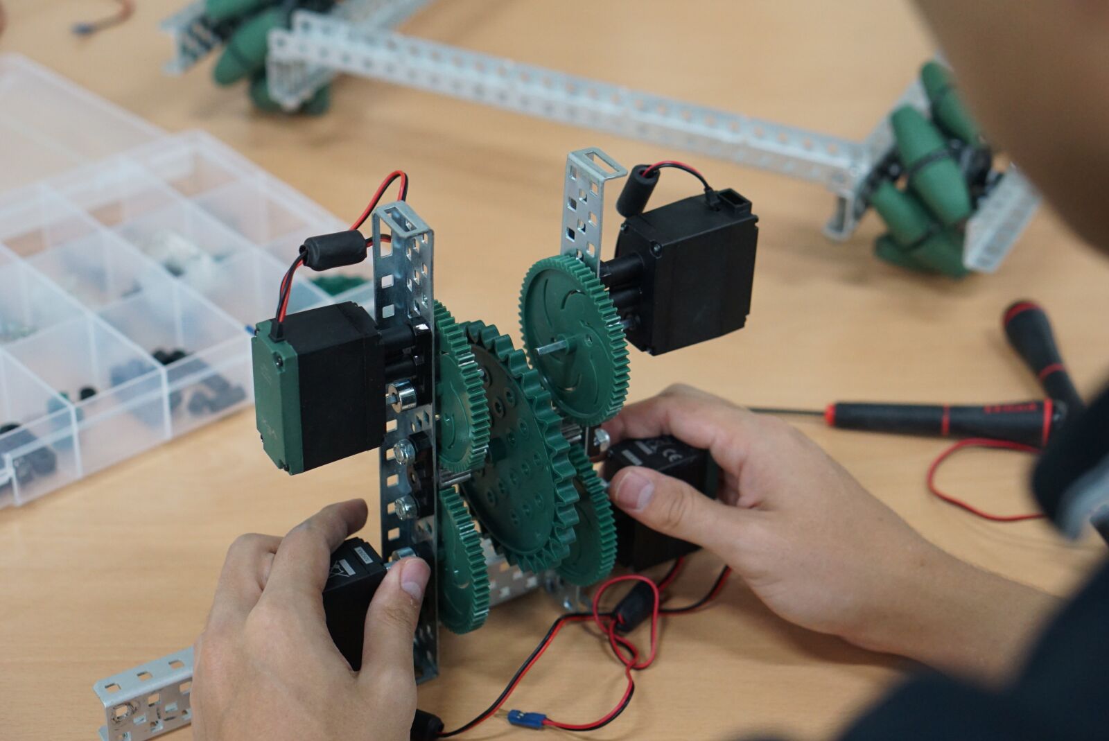 E 50mm F1.8 OSS sample photo. Robotics, robot, building photography